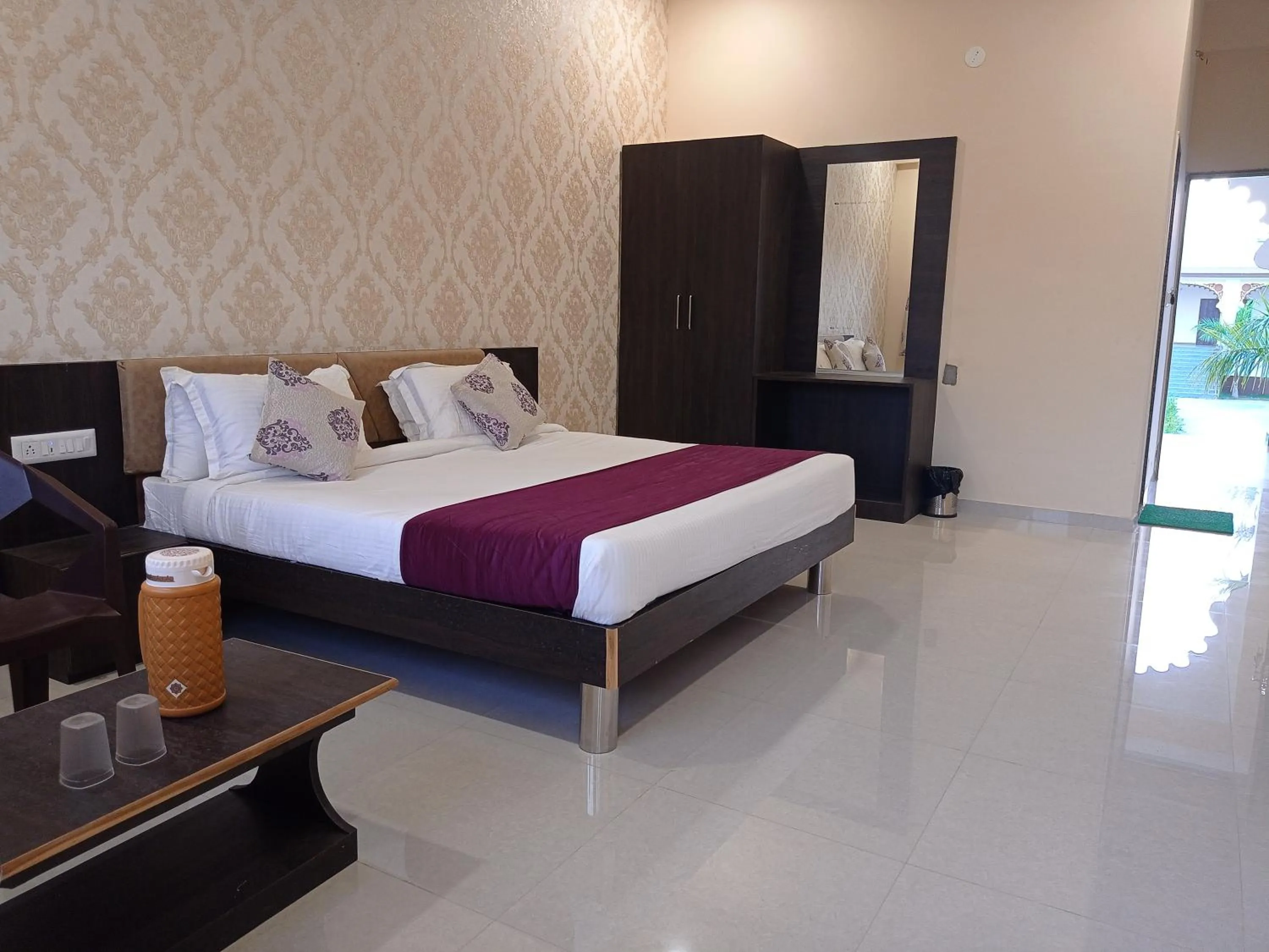 Bed in Vijayam Resort