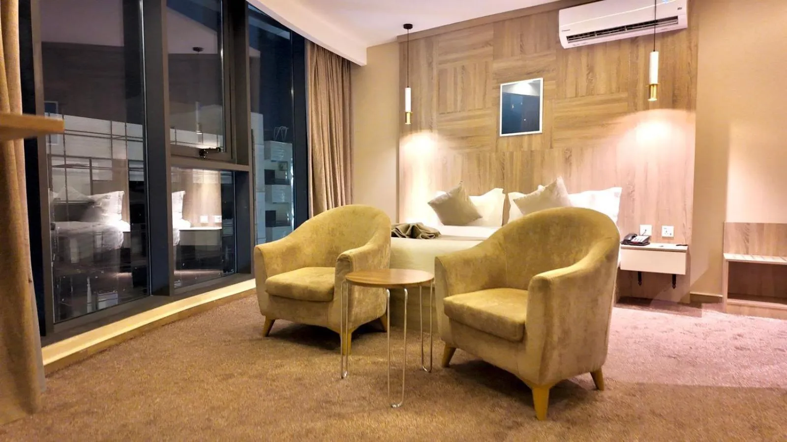 Bed in Twins Boutique Hotel