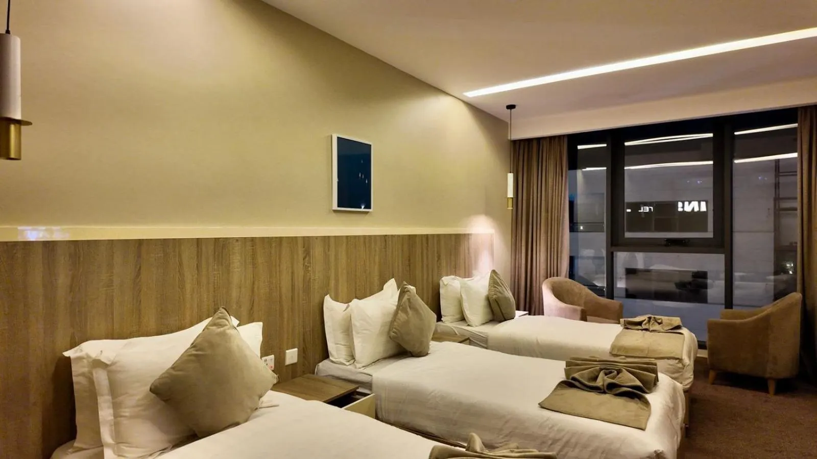 Bed in Twins Boutique Hotel