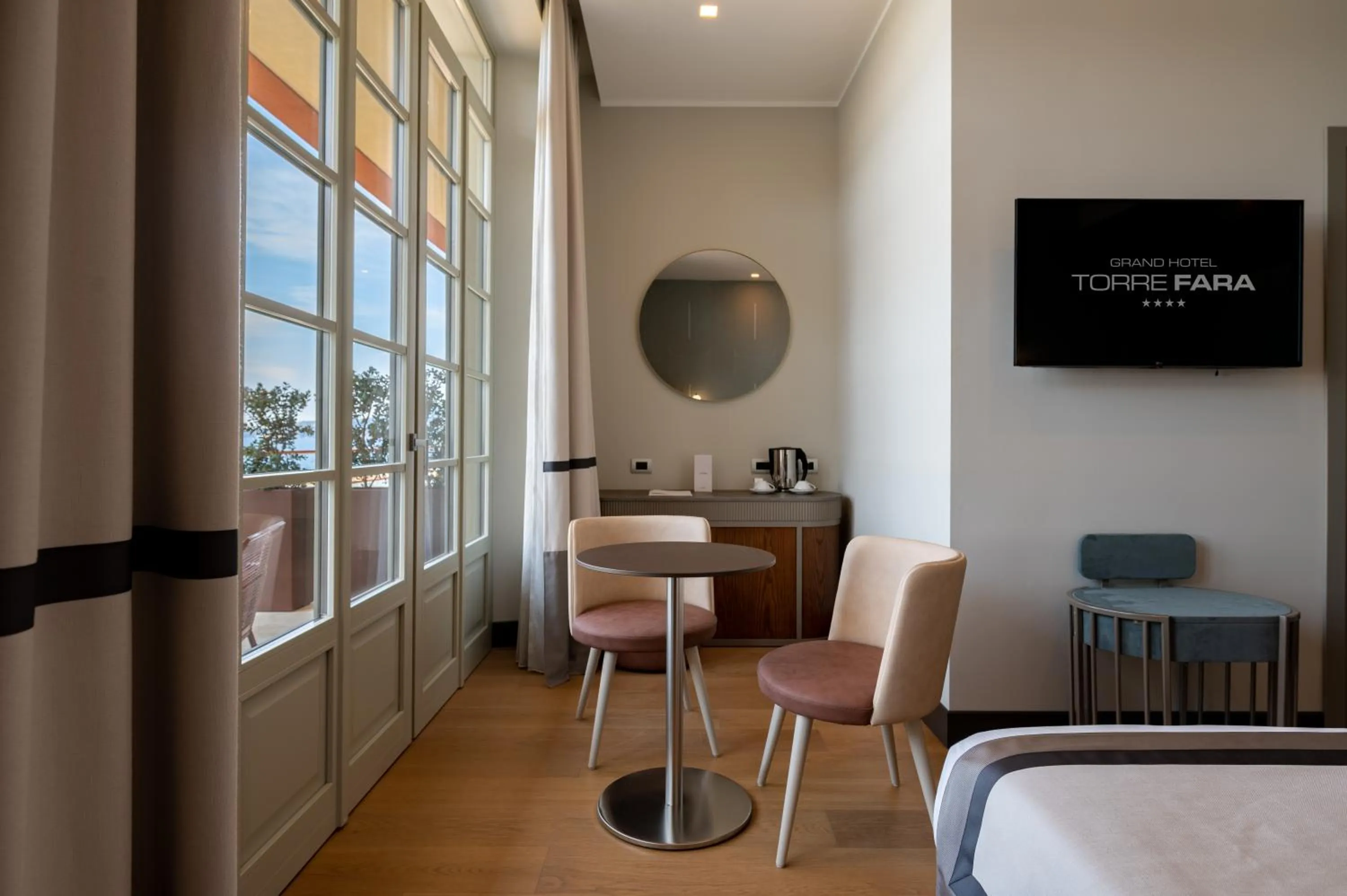 TV and multimedia in Grand Hotel Torre Fara