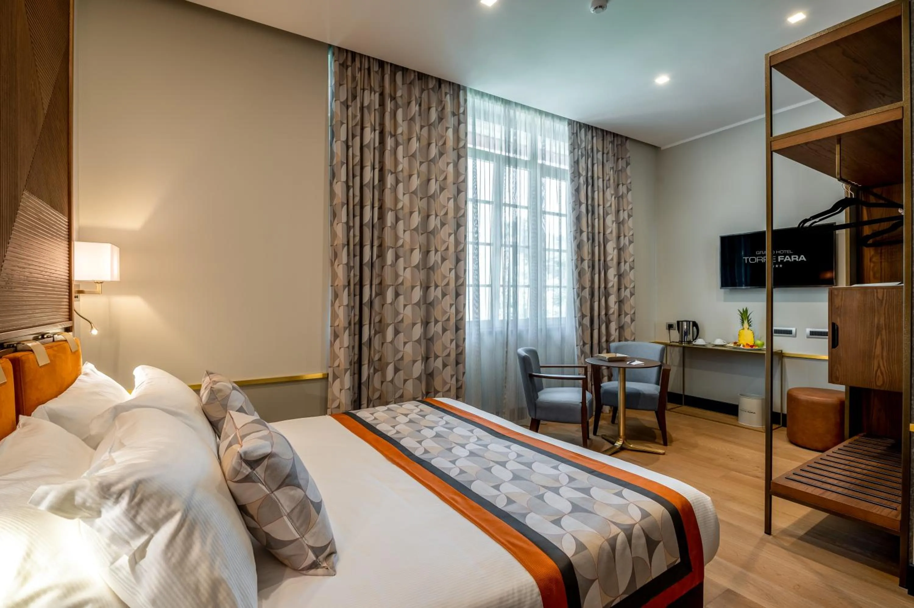 Photo of the whole room, Bed in Grand Hotel Torre Fara