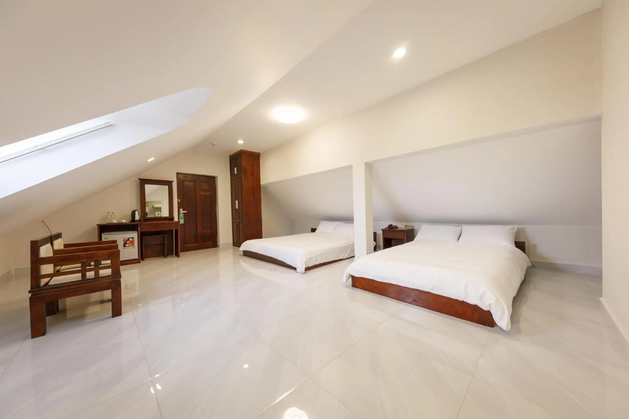 Bed in Bonjour Da Lat Hotel