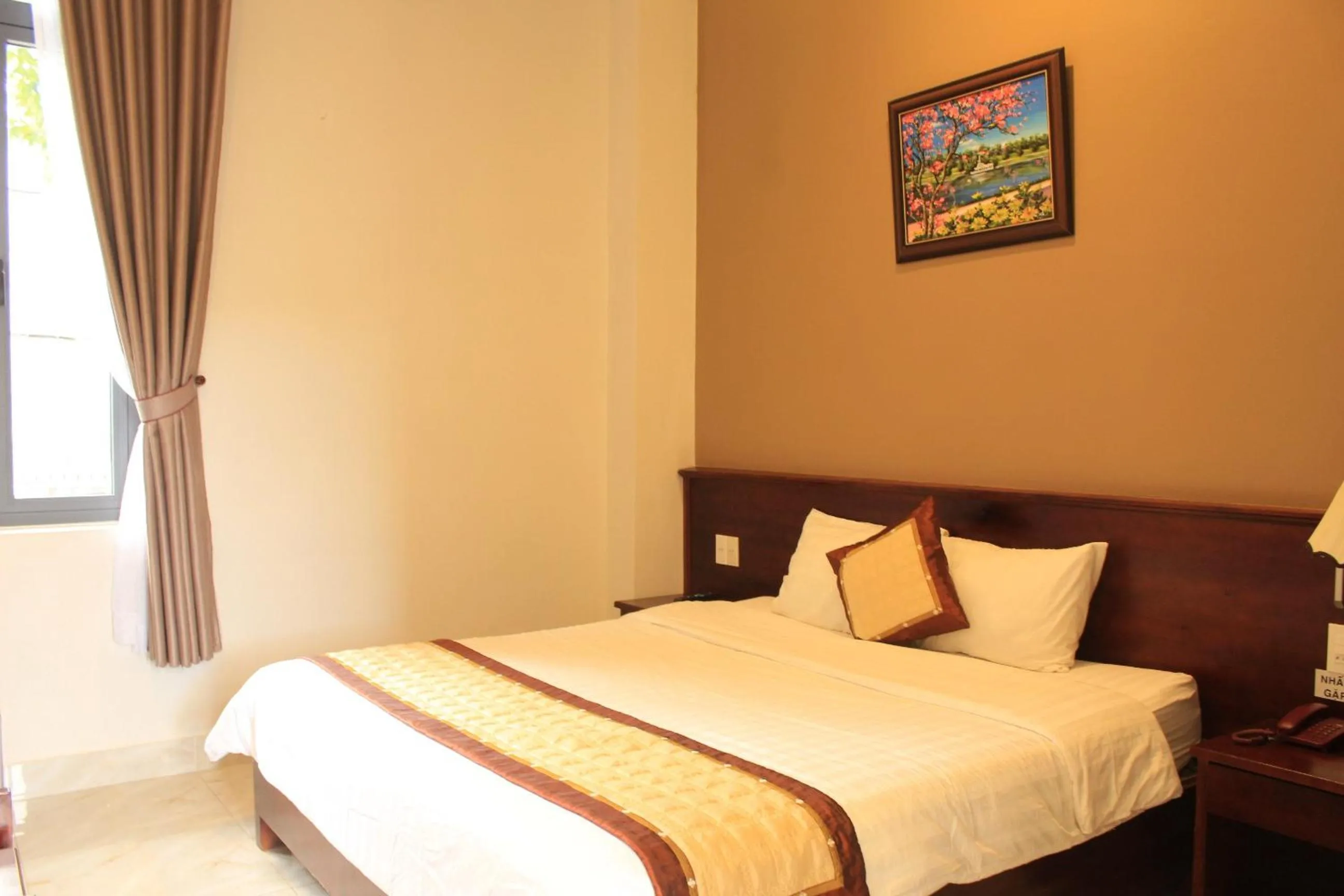 Bed in Bonjour Da Lat Hotel