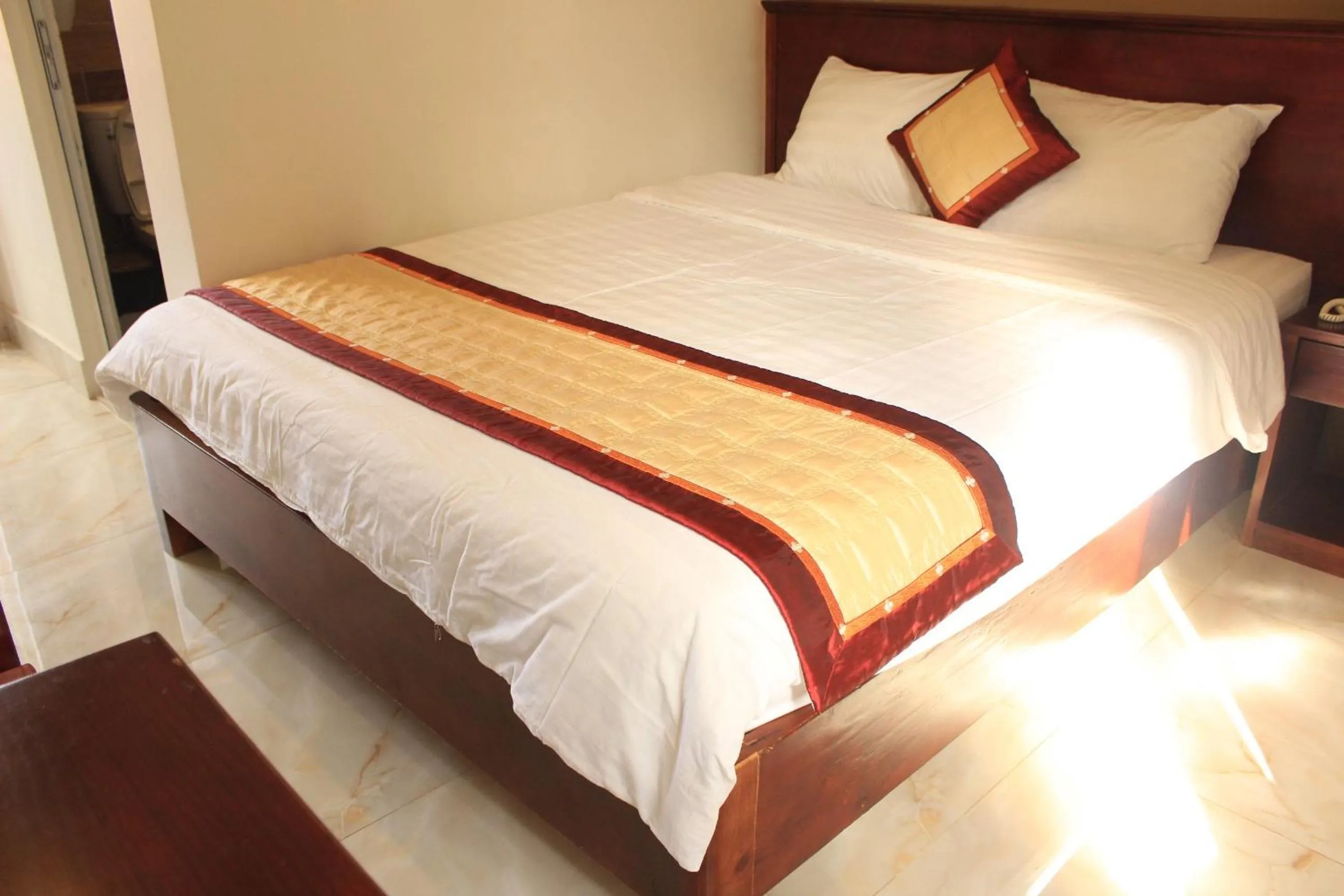 Bed in Bonjour Da Lat Hotel