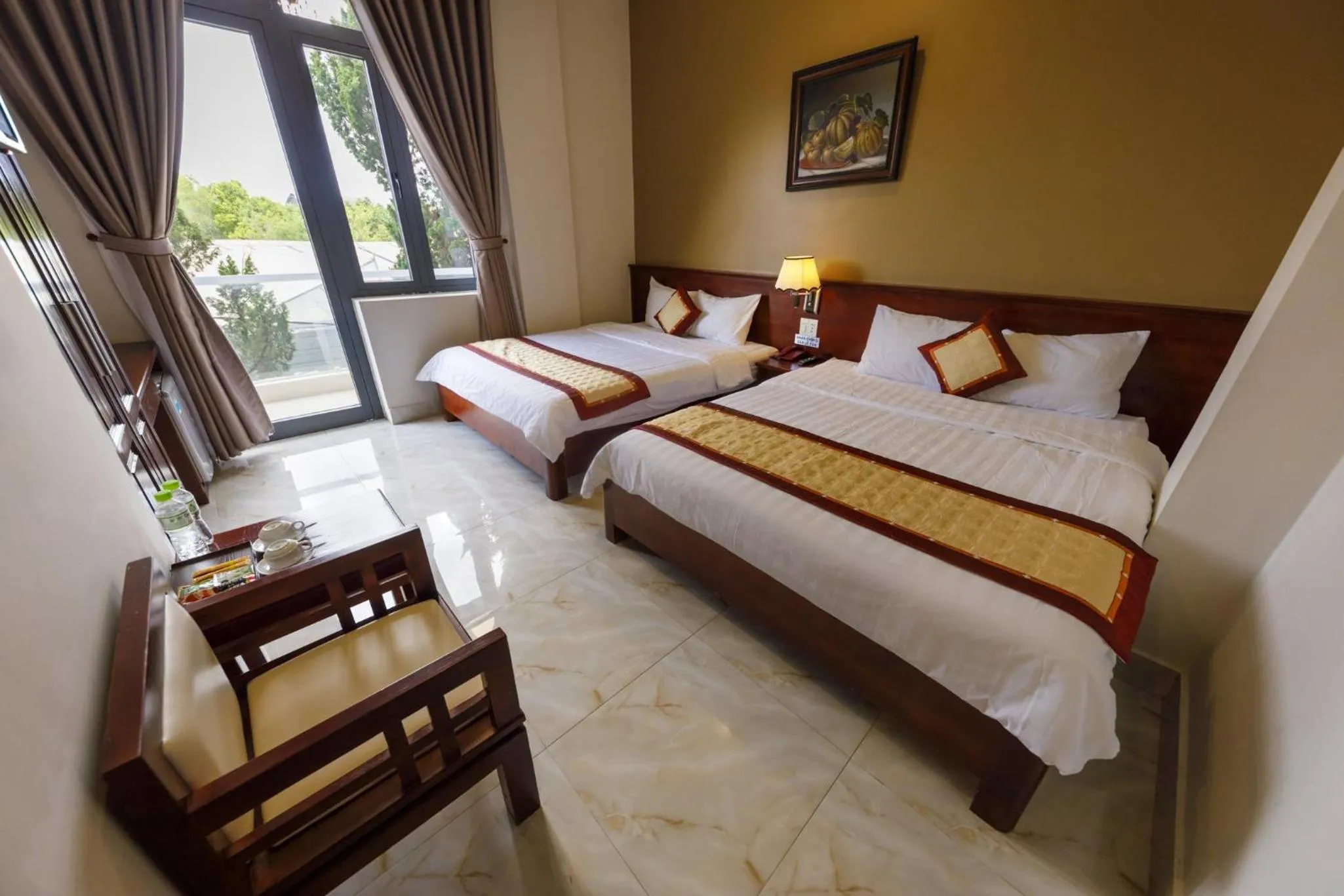 Photo of the whole room, Bed in Bonjour Da Lat Hotel
