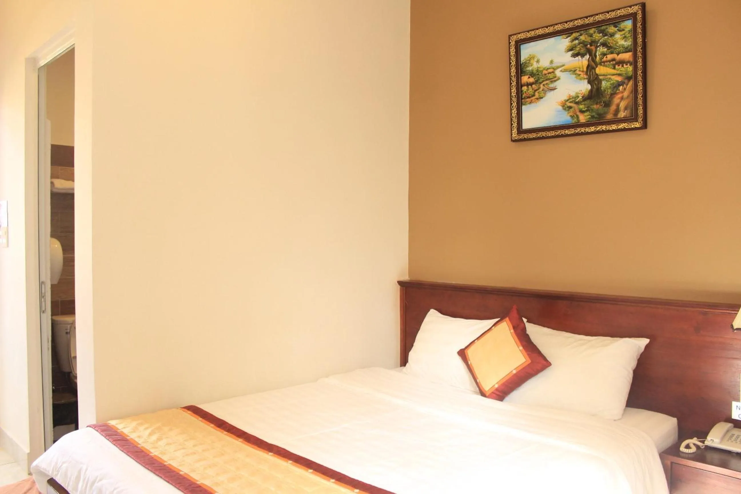 Bed in Bonjour Da Lat Hotel
