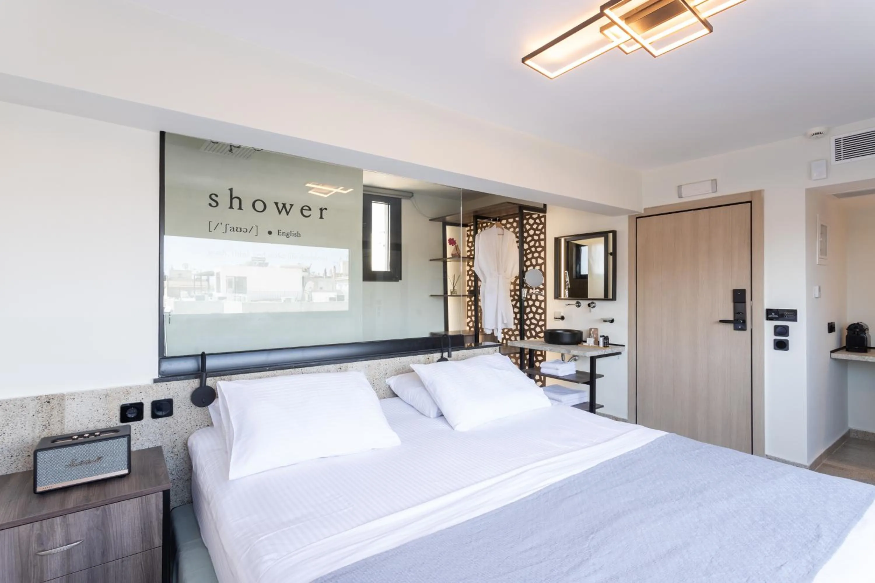 Bed in Athens Ivy Suites