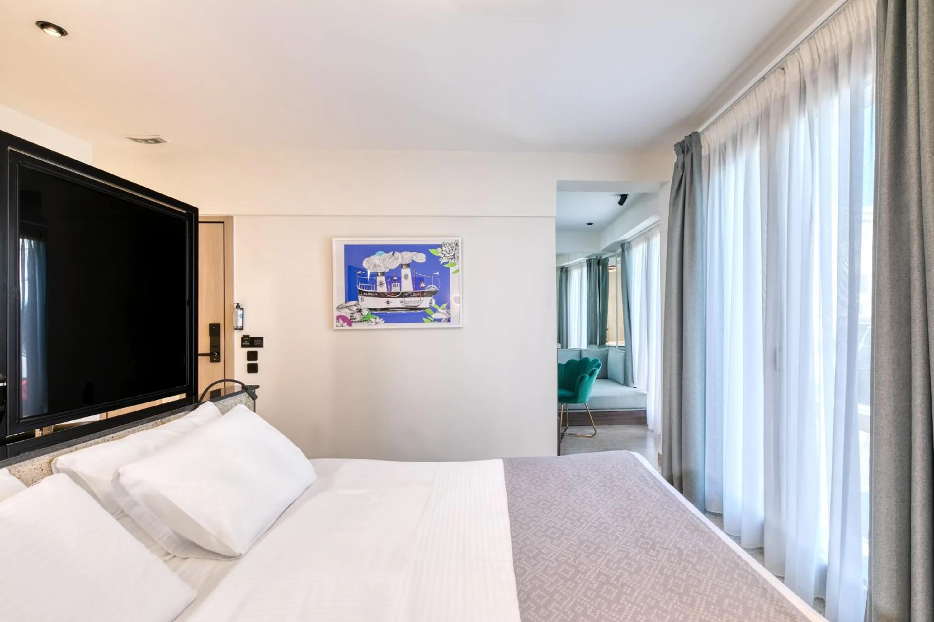 Bed in Athens Ivy Suites