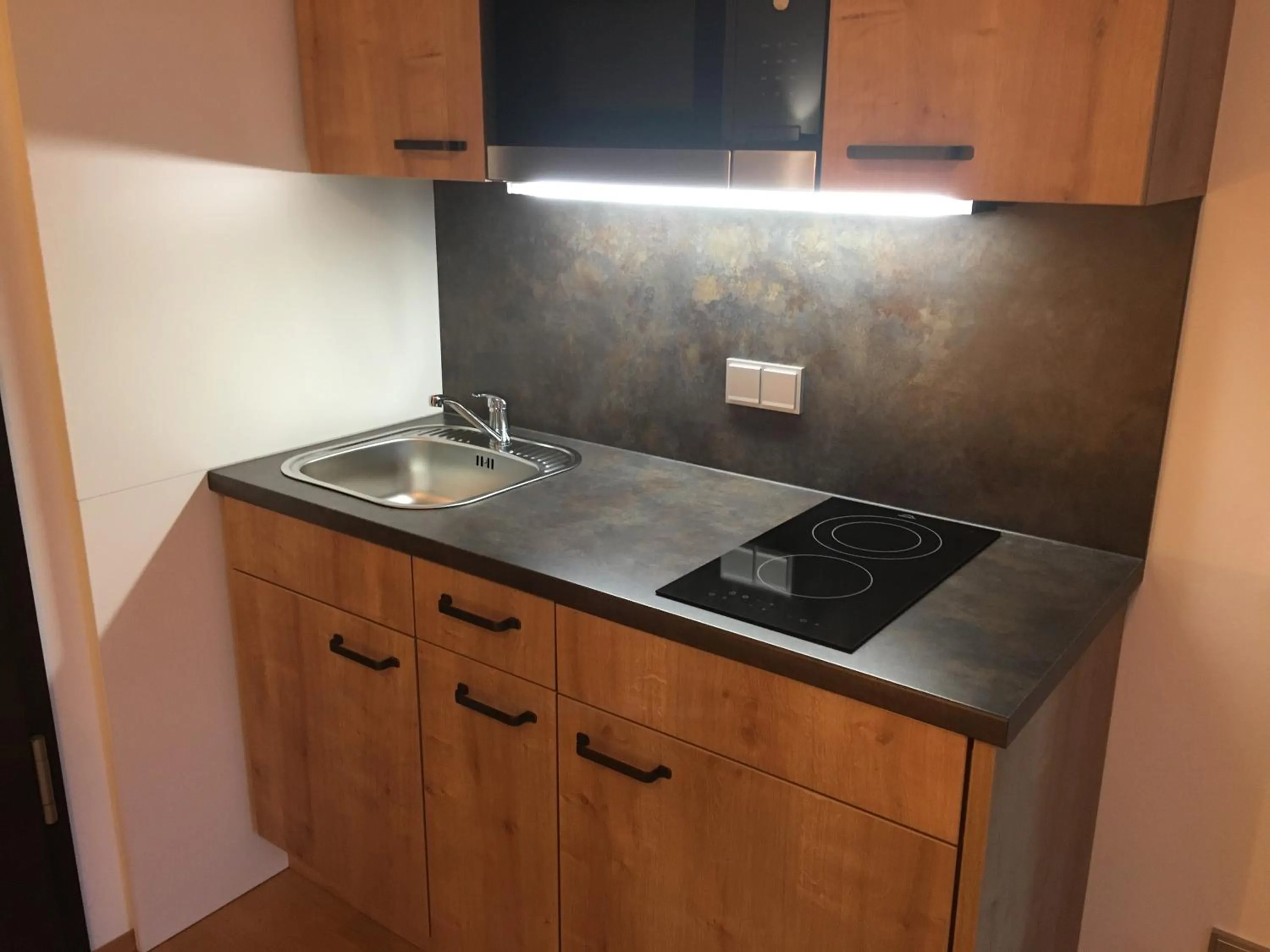 Kitchen or kitchenette in Parkhotel Leiser