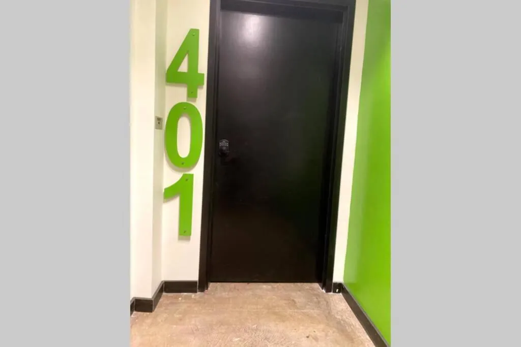 Property logo or sign in 3E-Cozy! Micro apartment! in Oakland, sleeps 1