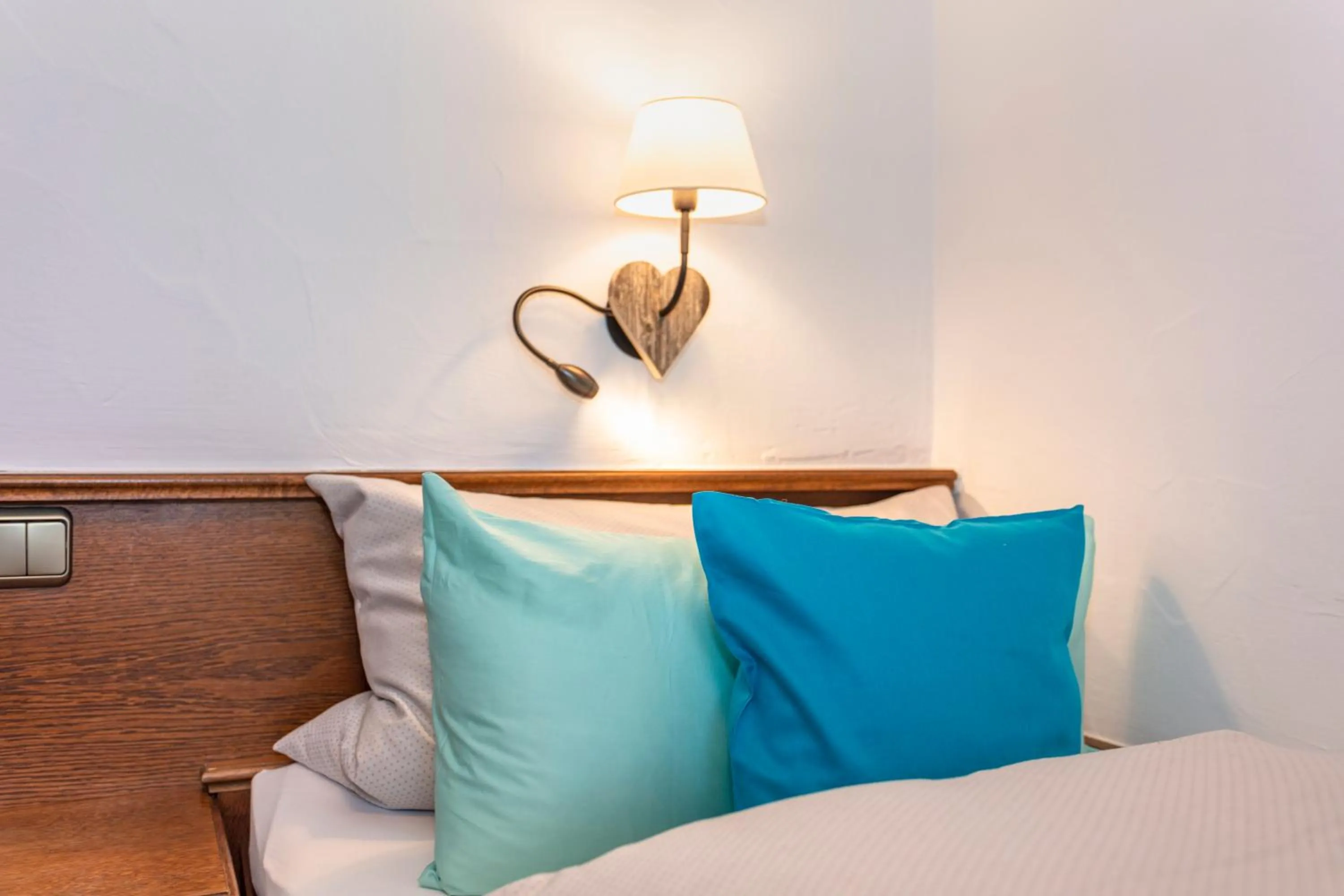 Bed in Pension Pinzgauer Hof