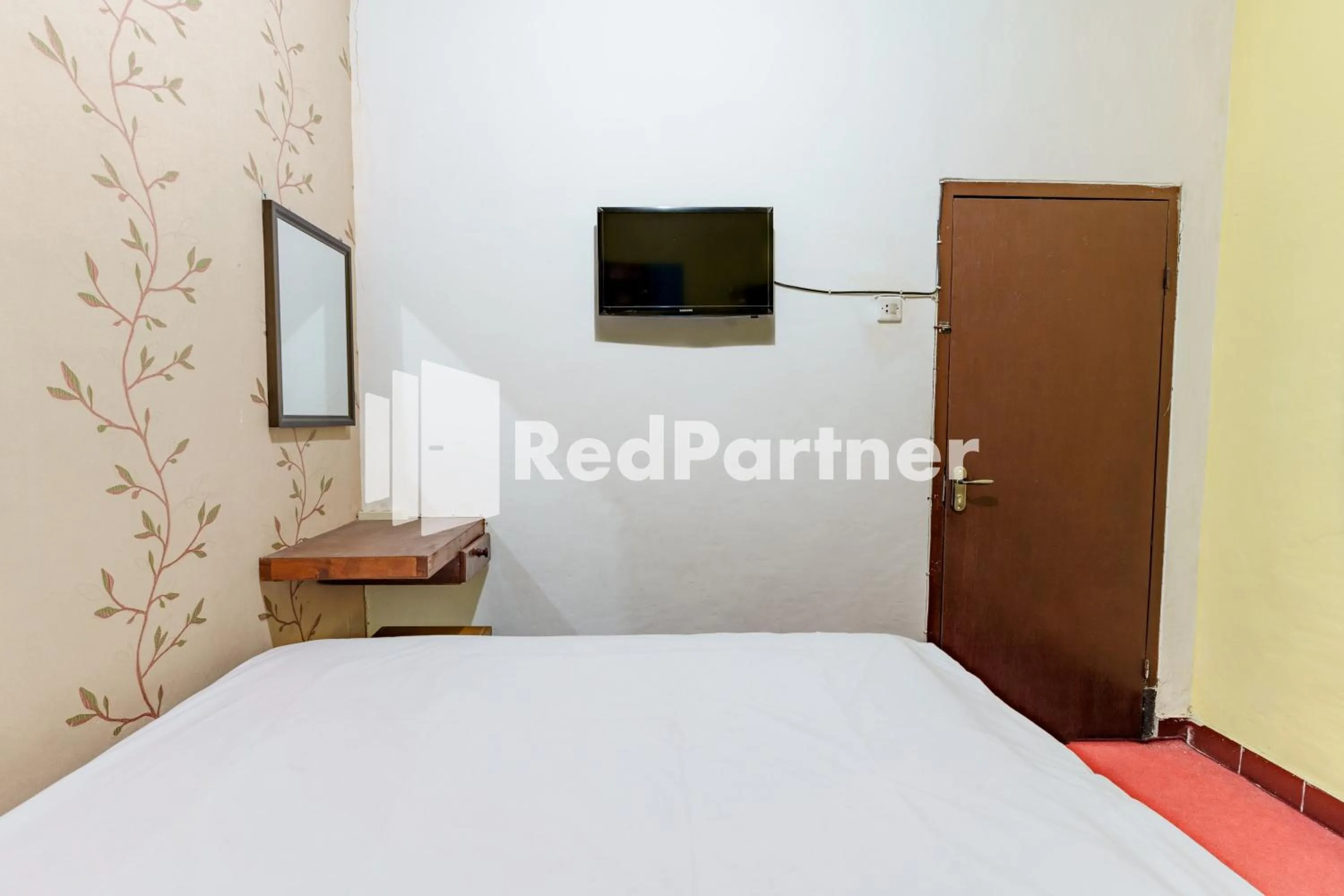 Bed in Nafisa Homestay Syariah Near Jatim Park 3 Batu Mitra RedDoorz