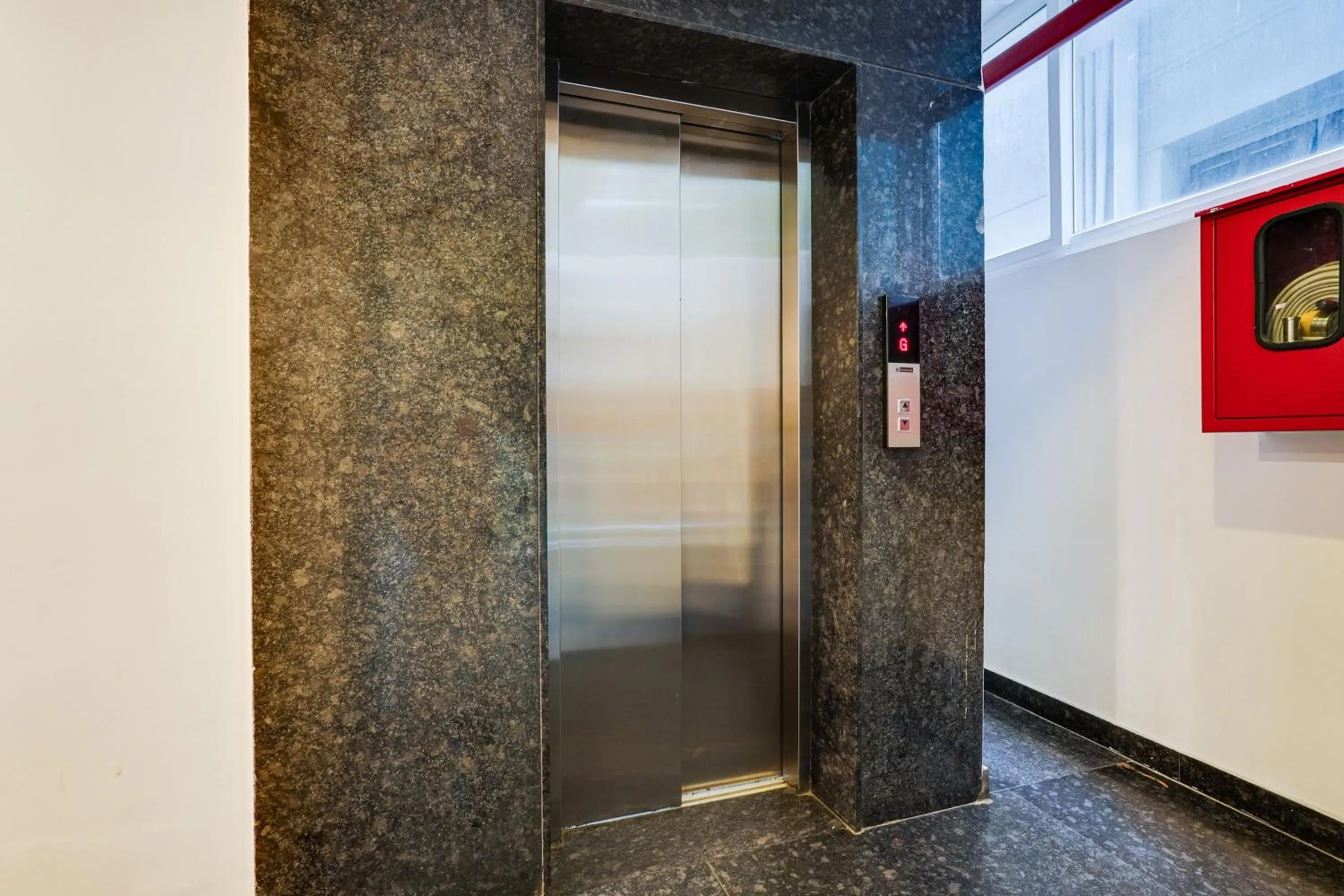 Lobby or reception in Super Townhouse Oak Indiranagar