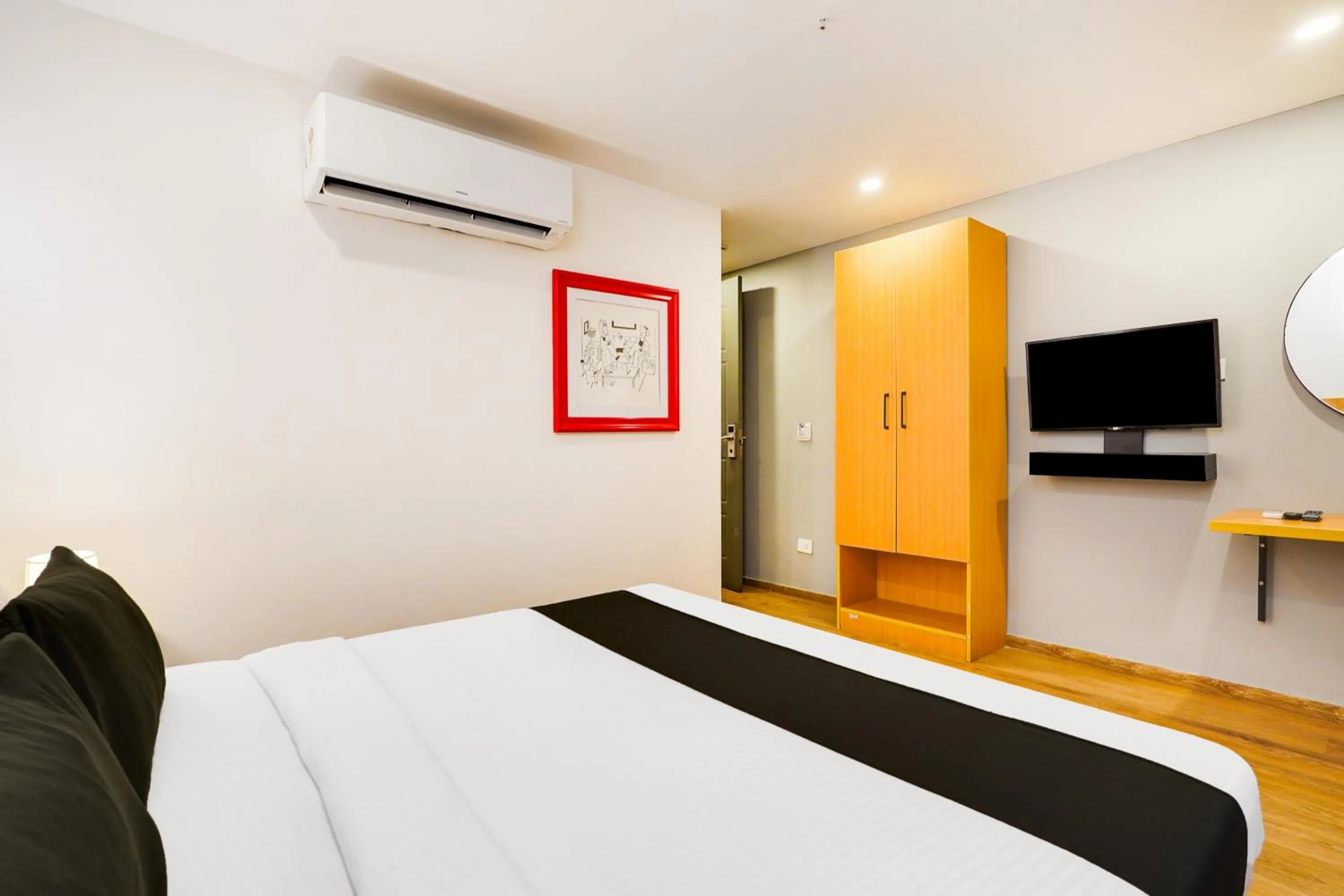 Bedroom in Super Townhouse Oak Indiranagar