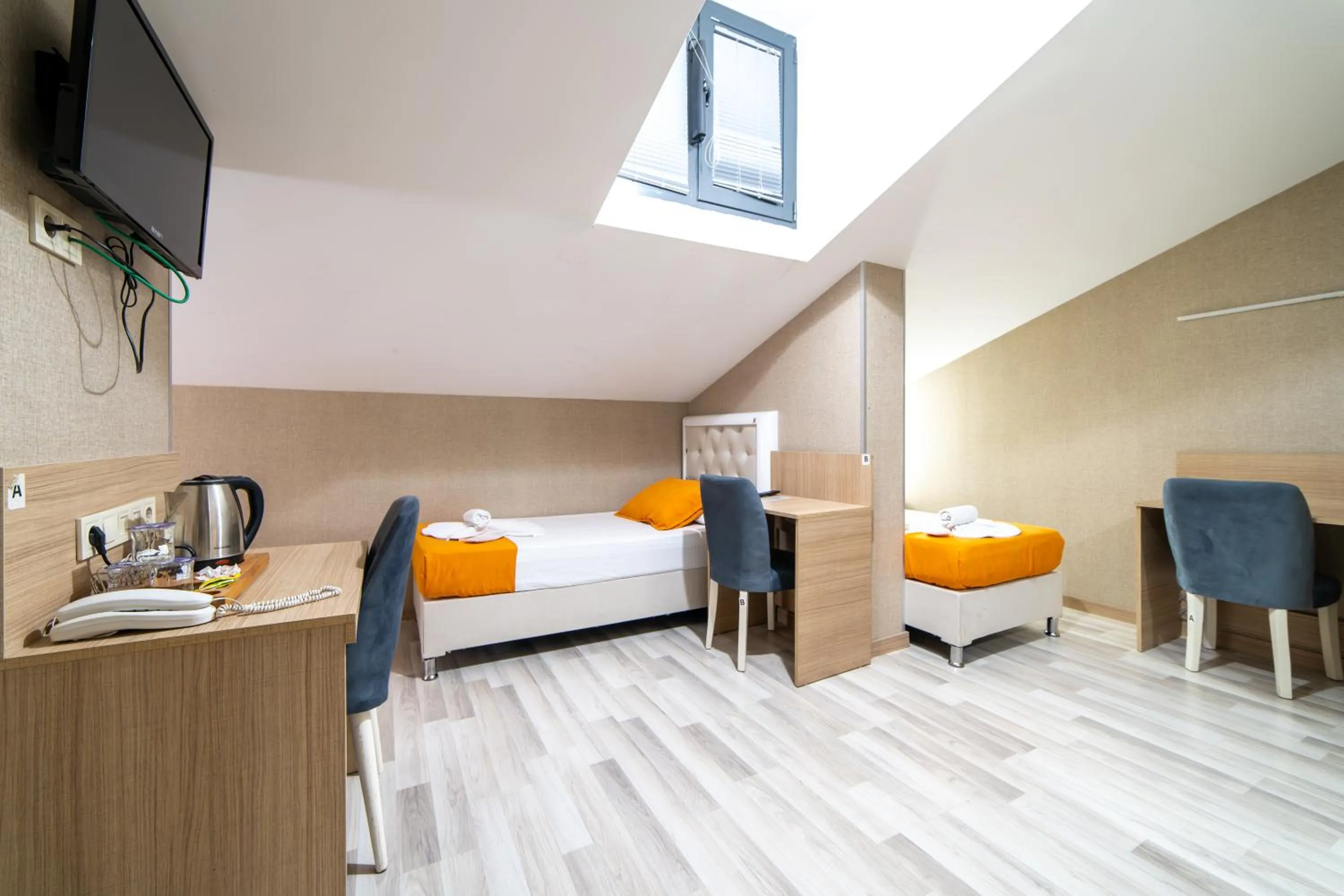 Bed in Mardy Suit Hotel