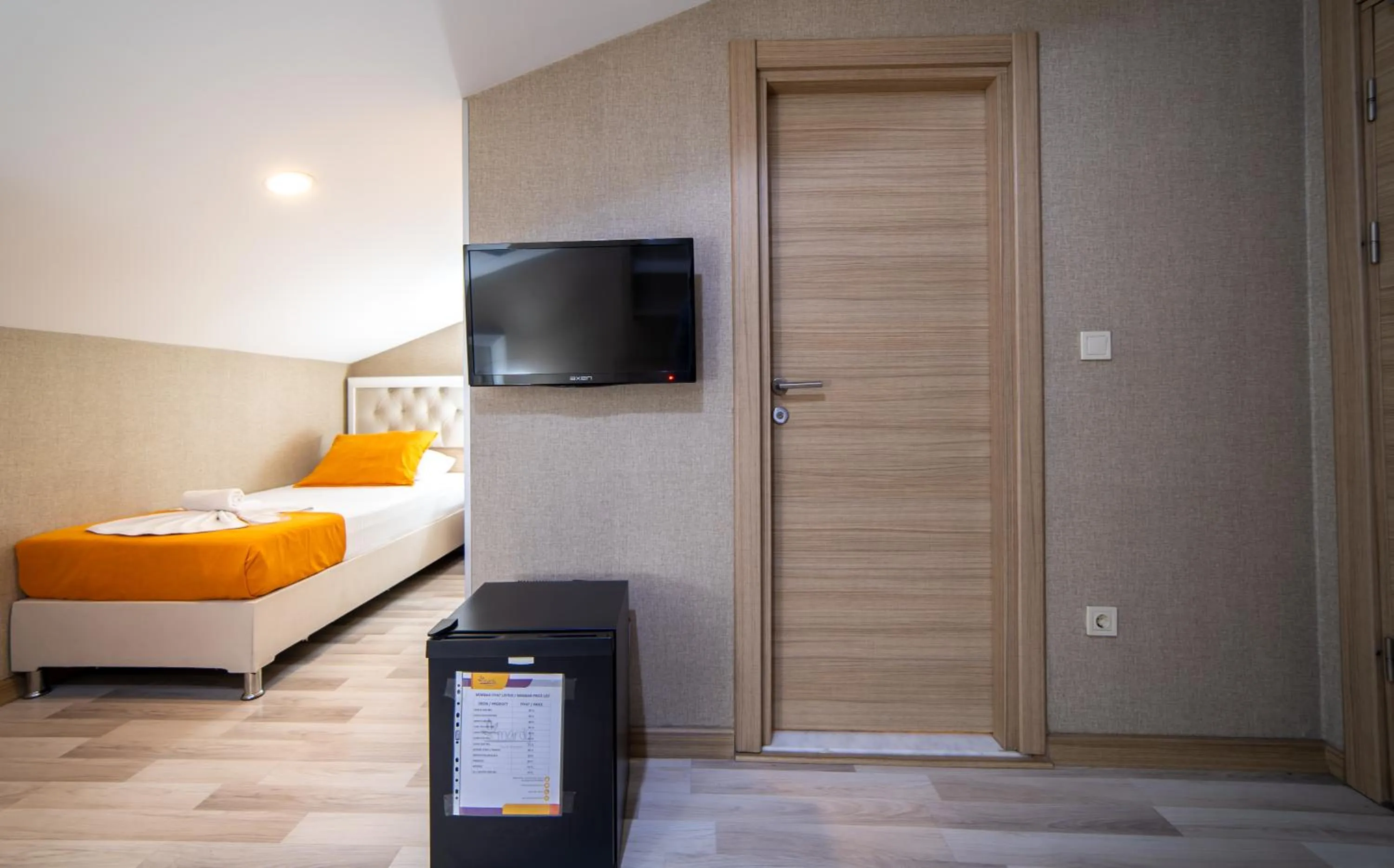 Bed in Mardy Suit Hotel