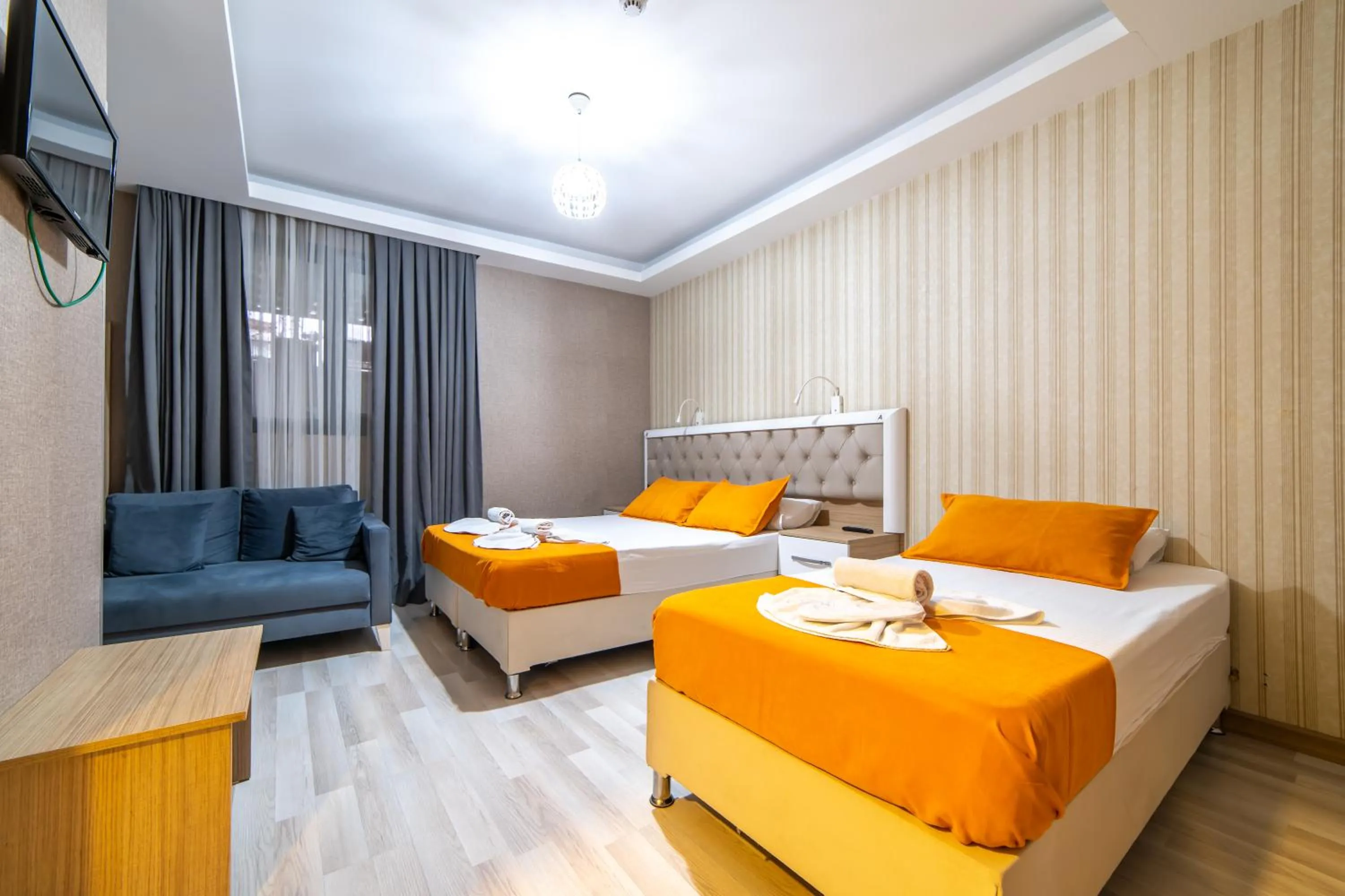 Bed in Mardy Suit Hotel