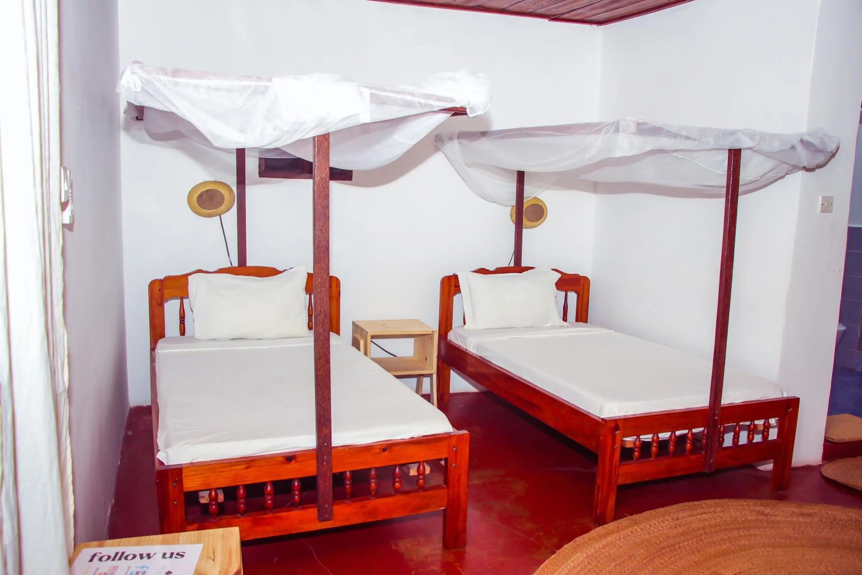 Bed in TIKI Beach Club & Resort