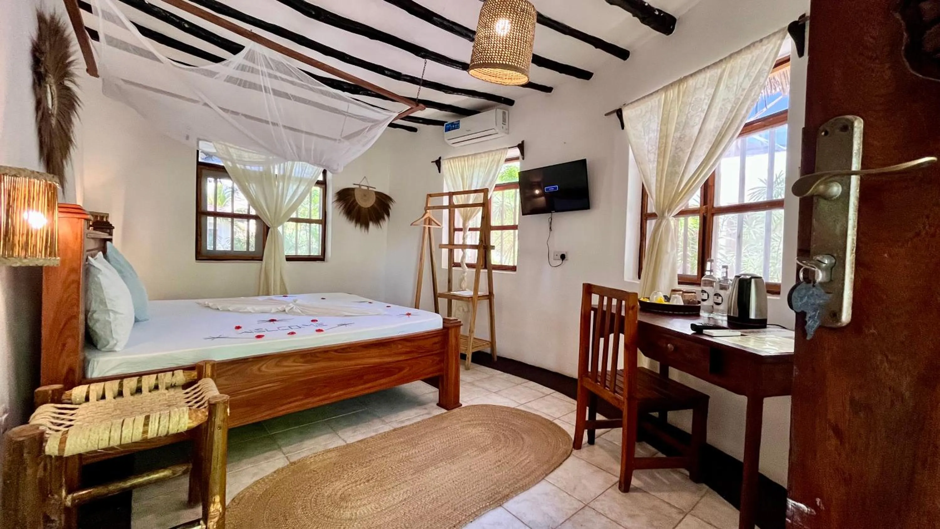 Bed in TIKI Beach Club & Resort