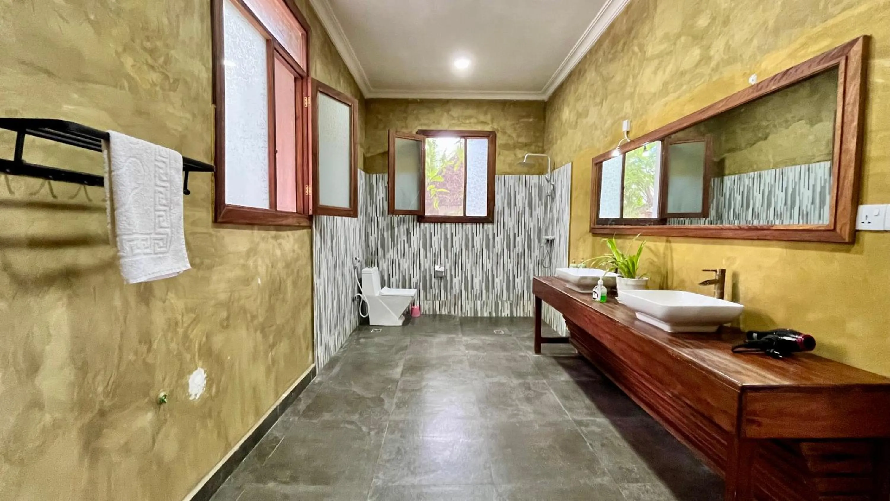 Bathroom in TIKI Beach Club & Resort