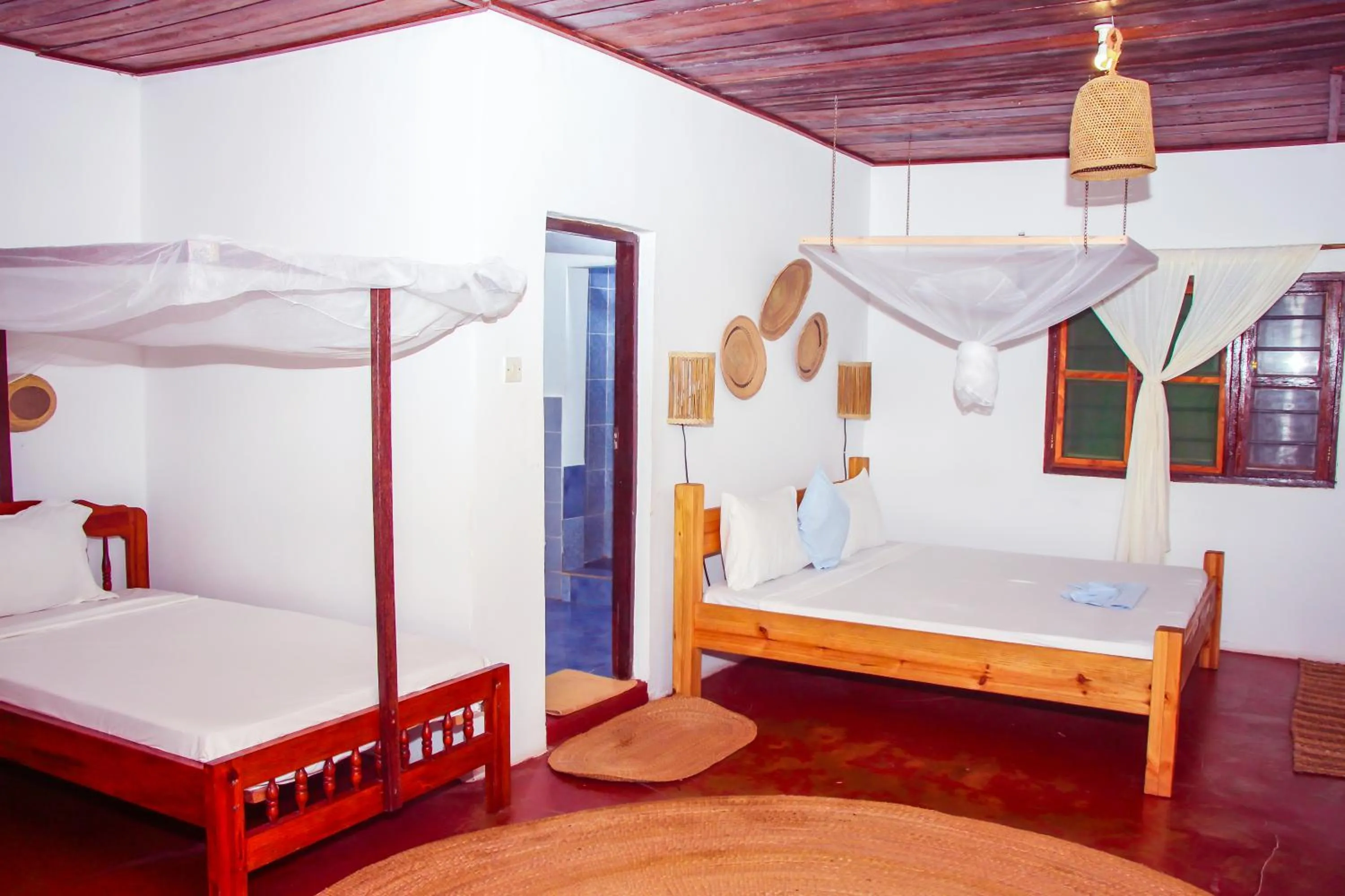 Bed in TIKI Beach Club & Resort