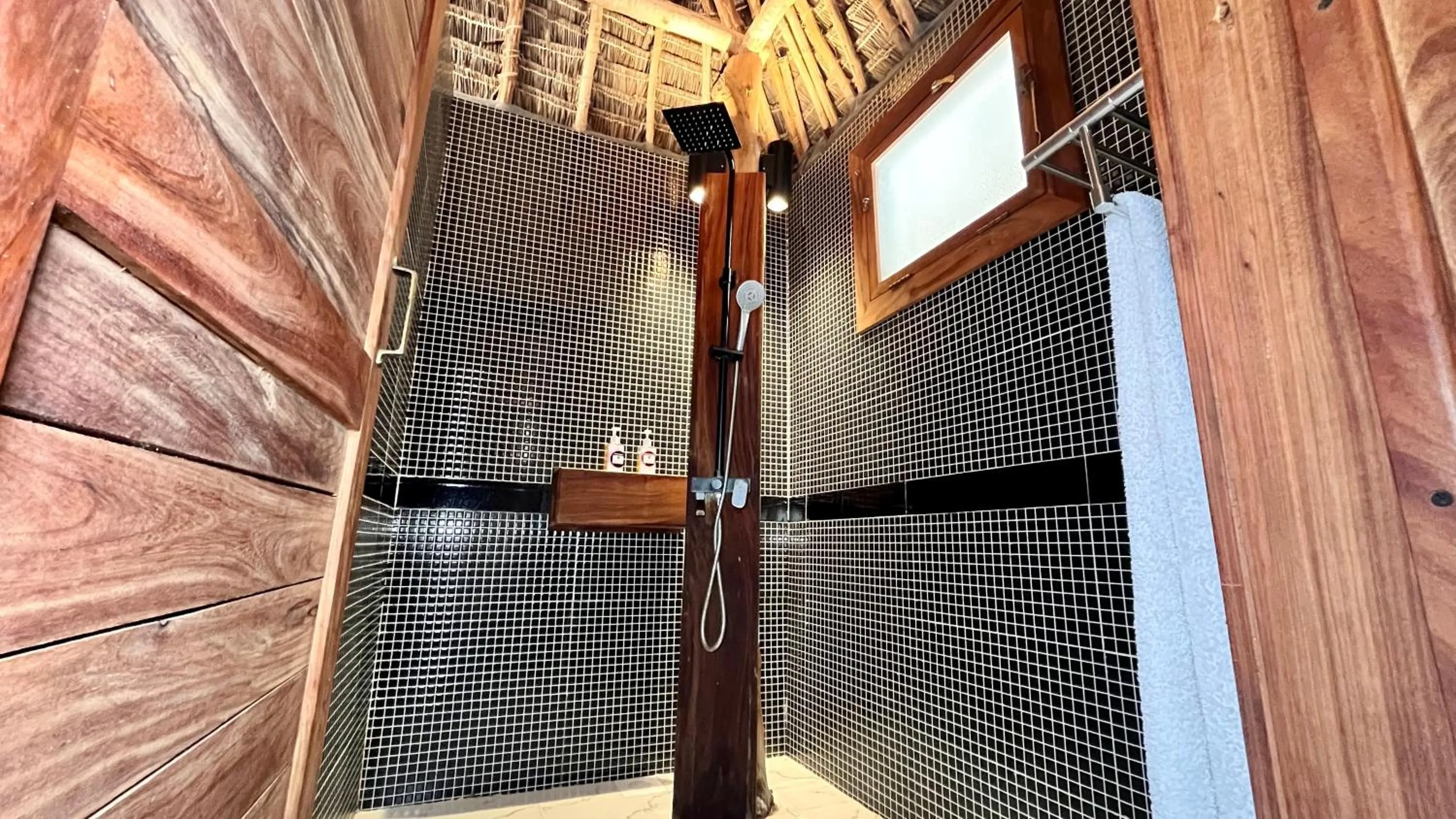 Shower in TIKI Beach Club & Resort