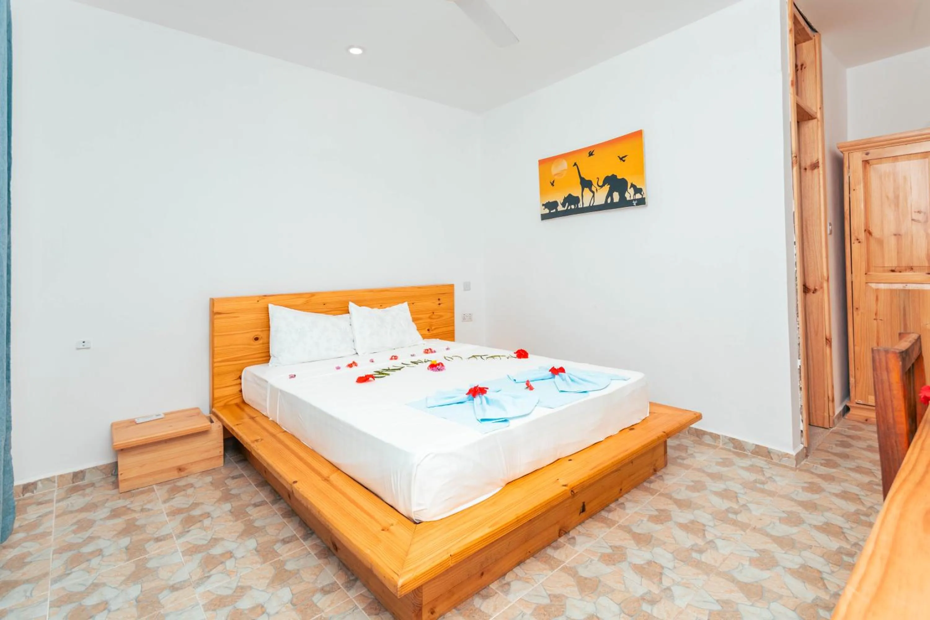 Bed in TIKI Beach Club & Resort