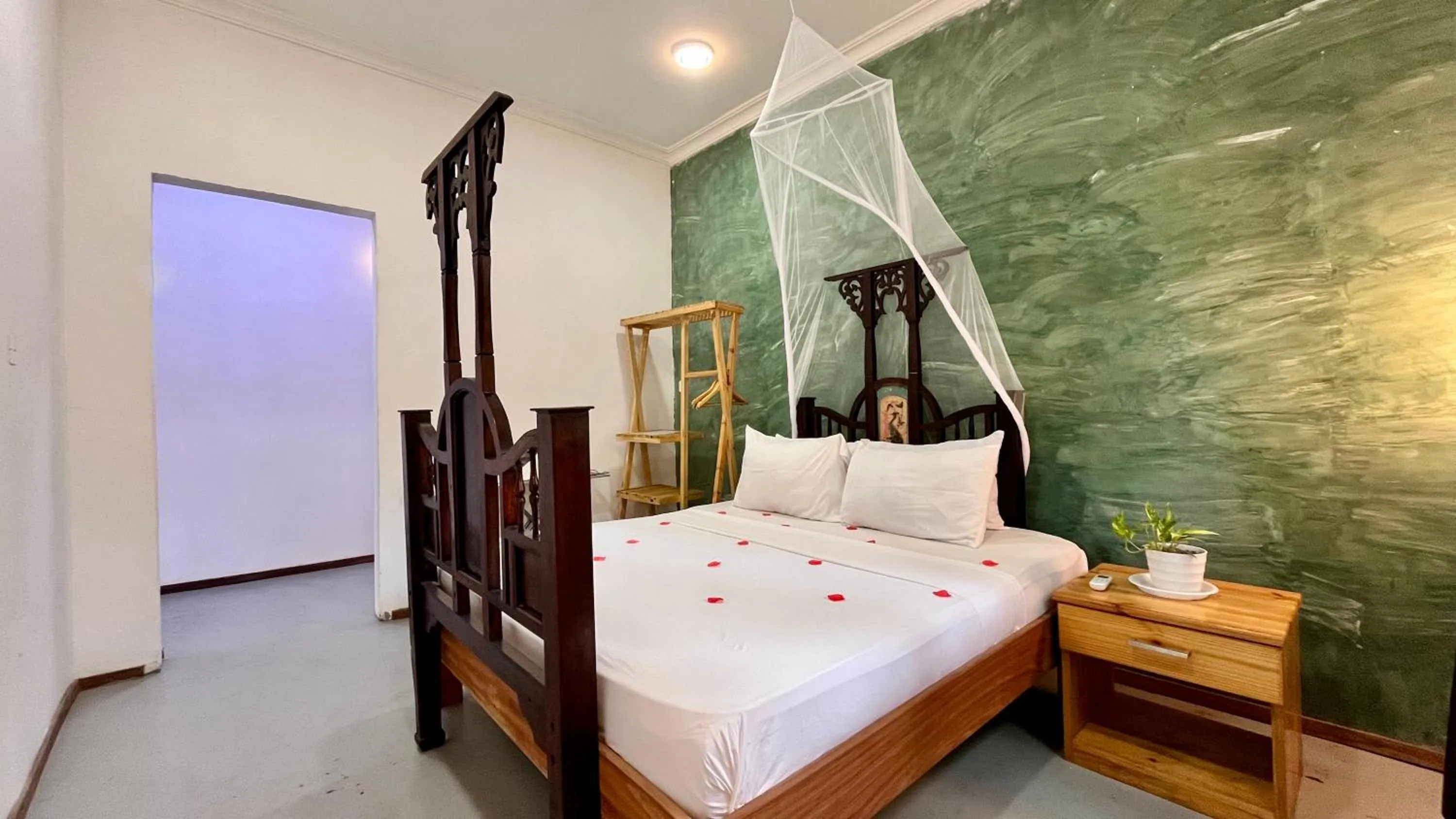 Bed in TIKI Beach Club & Resort