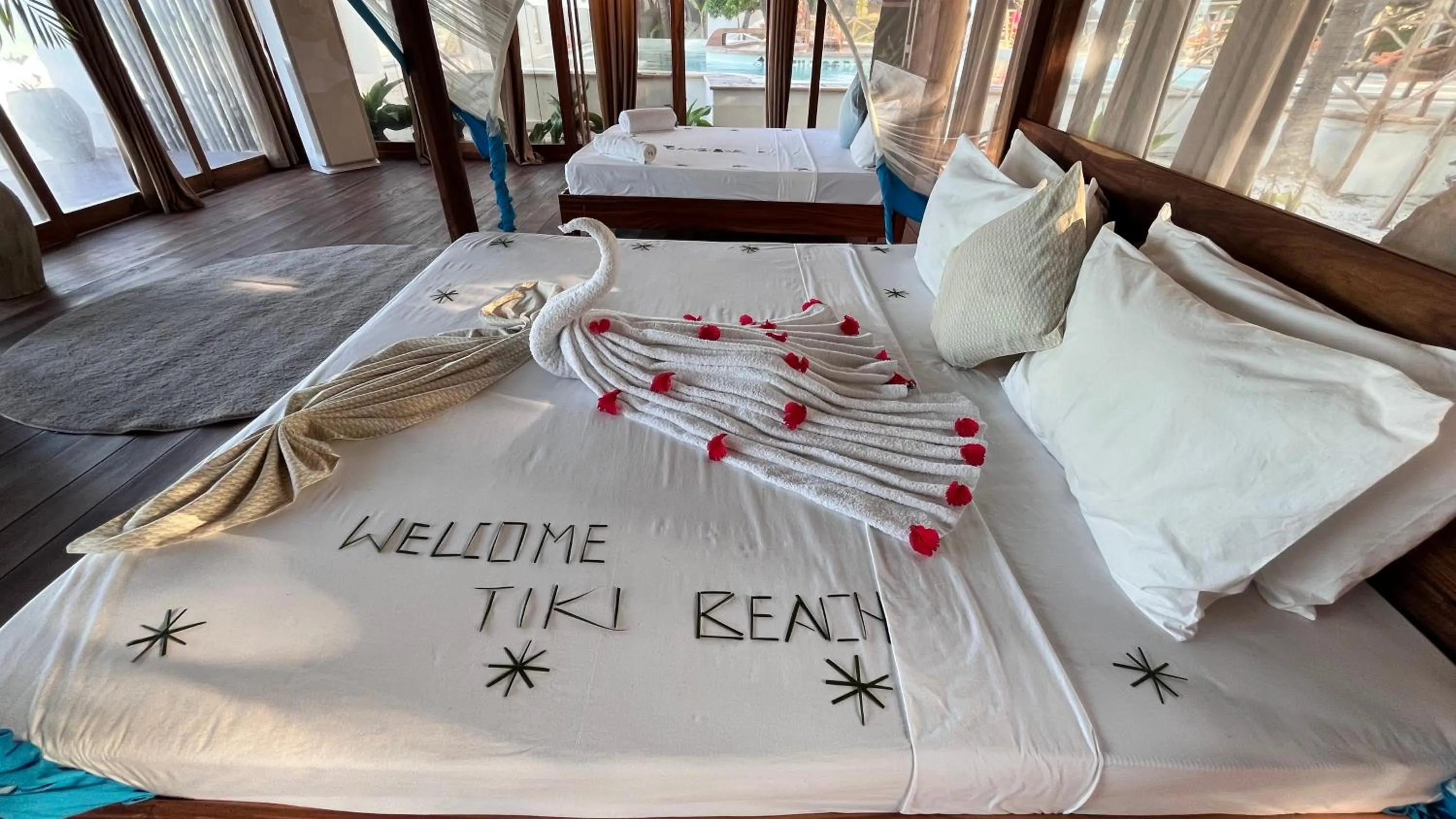 Bed in TIKI Beach Club & Resort