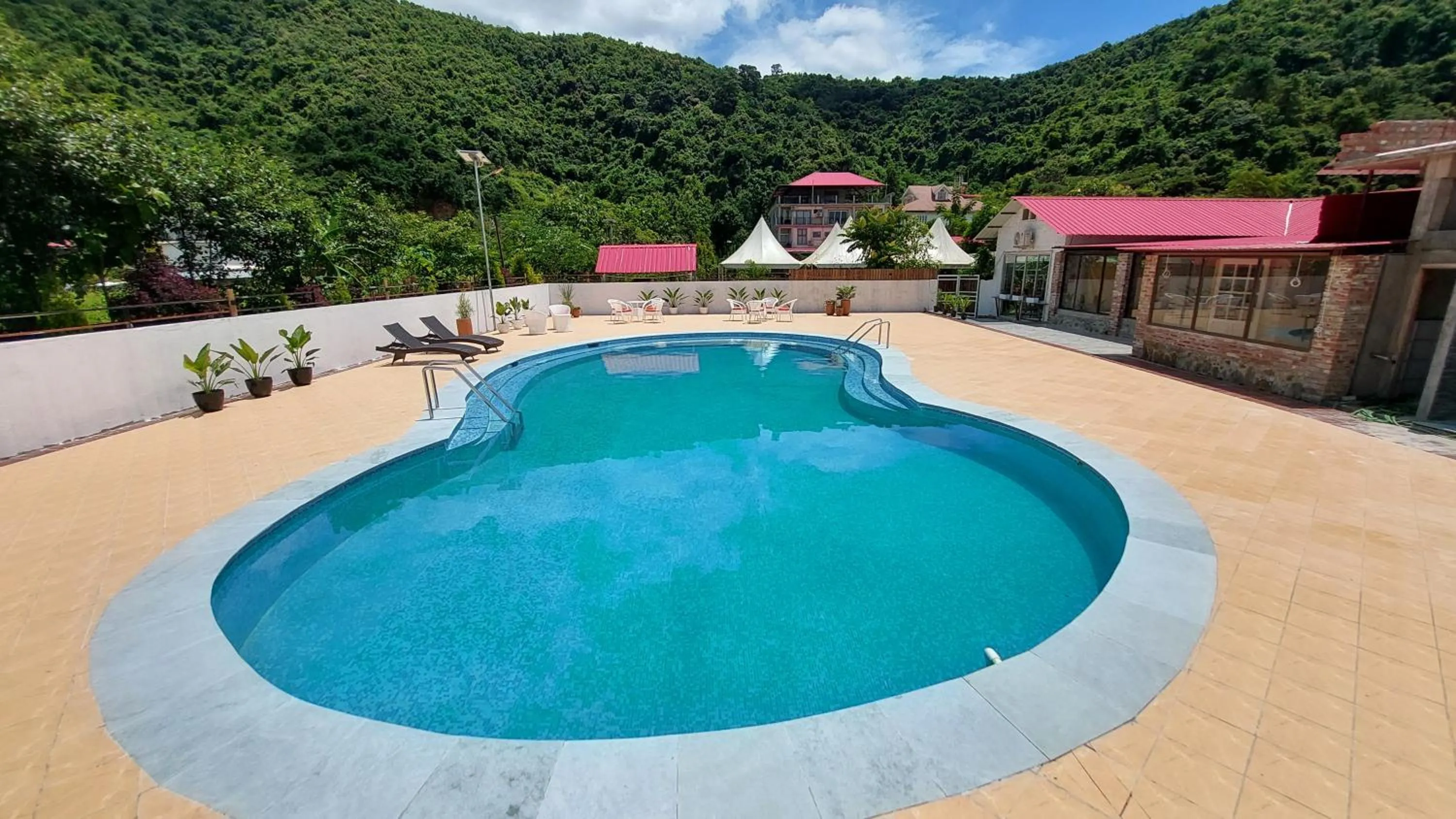 Swimming pool in Shalom Farmhouse by the hillside