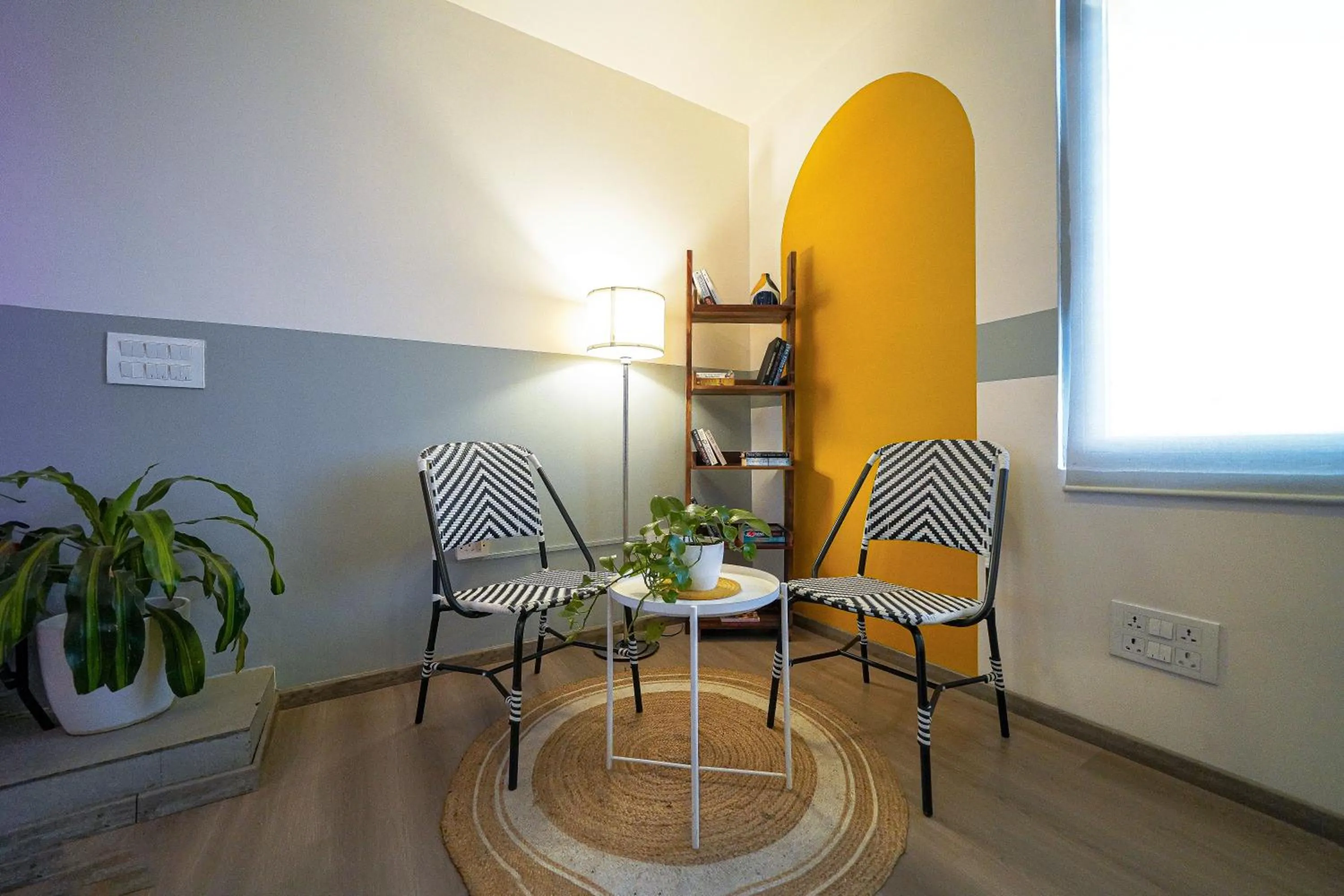 Seating area in Olive Hotel Indiranagar by Embassy Group