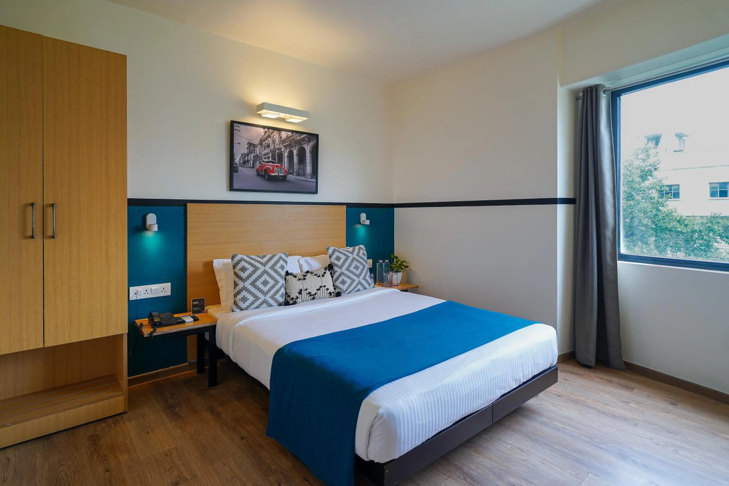 Photo of the whole room, Bed in Olive Hotel Indiranagar by Embassy Group