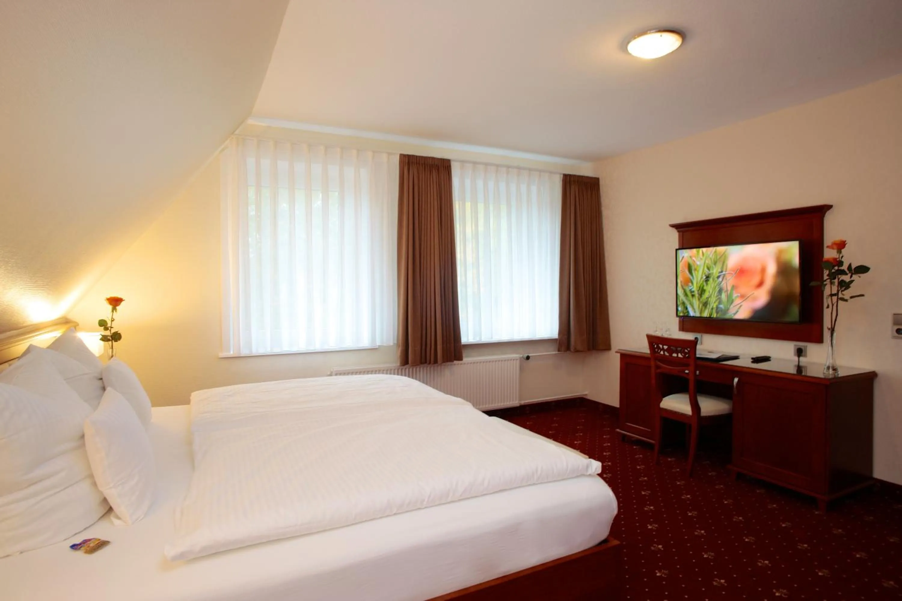 Photo of the whole room, Bed in Ringhotel Fährhaus