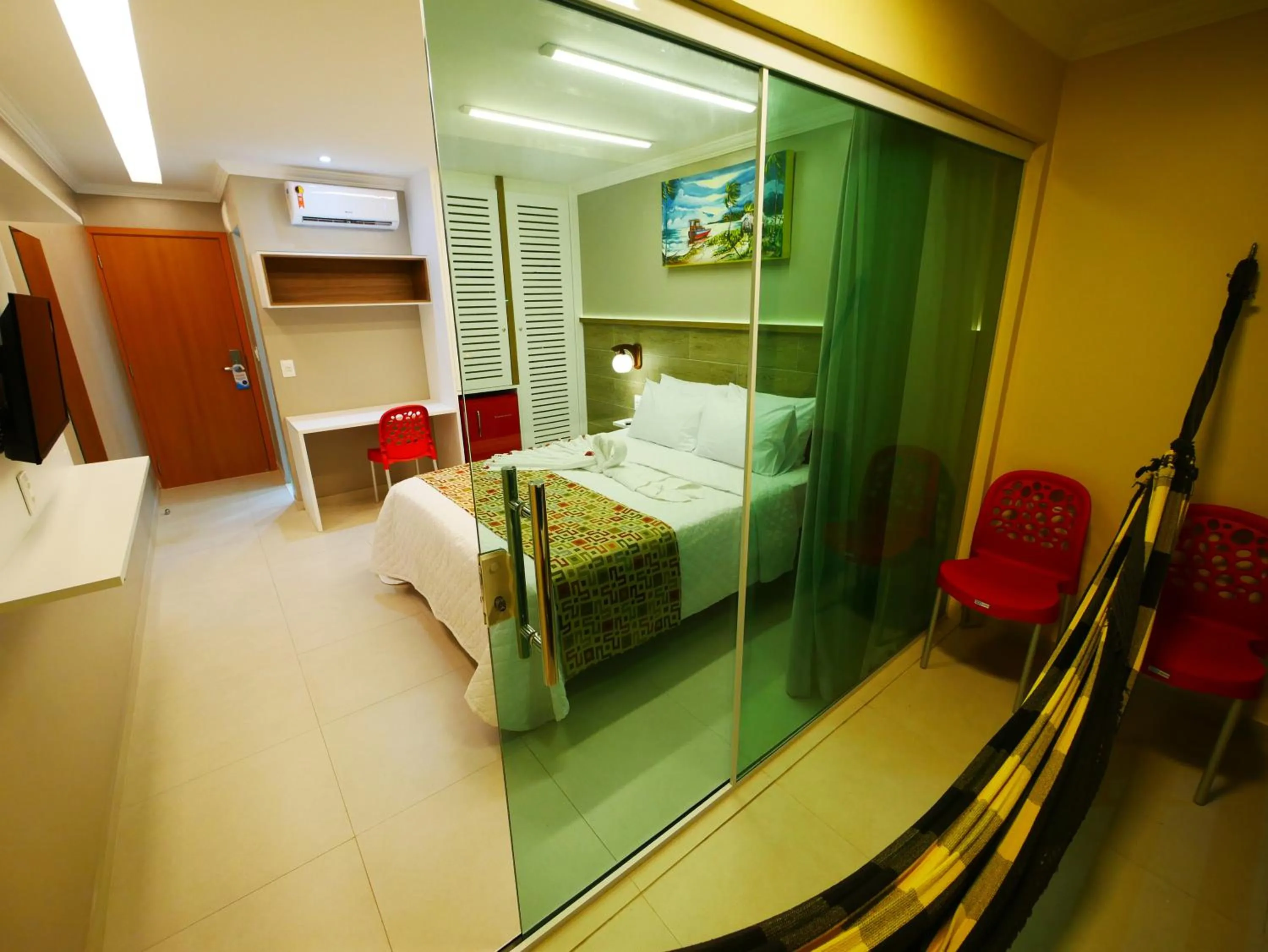 Bed in Pousada Recanto dos Corais