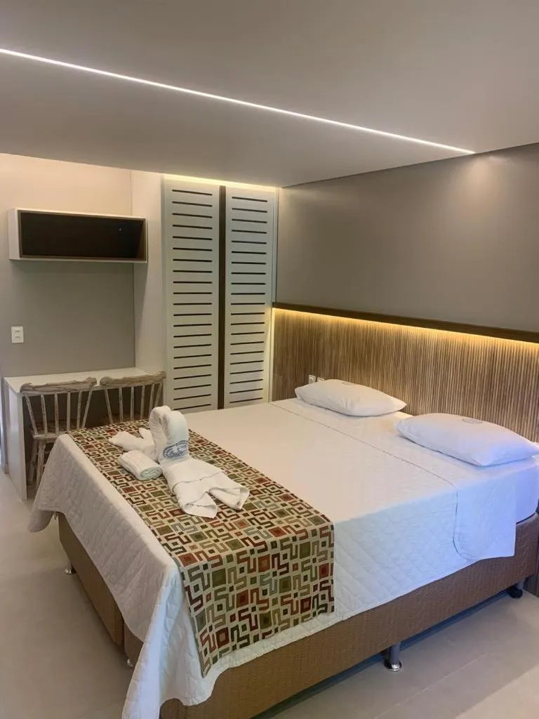 Bed in Pousada Recanto dos Corais