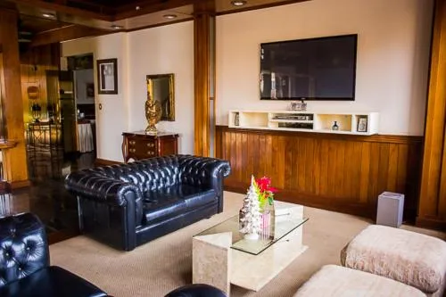 Communal lounge/ TV room in Hotel Marques