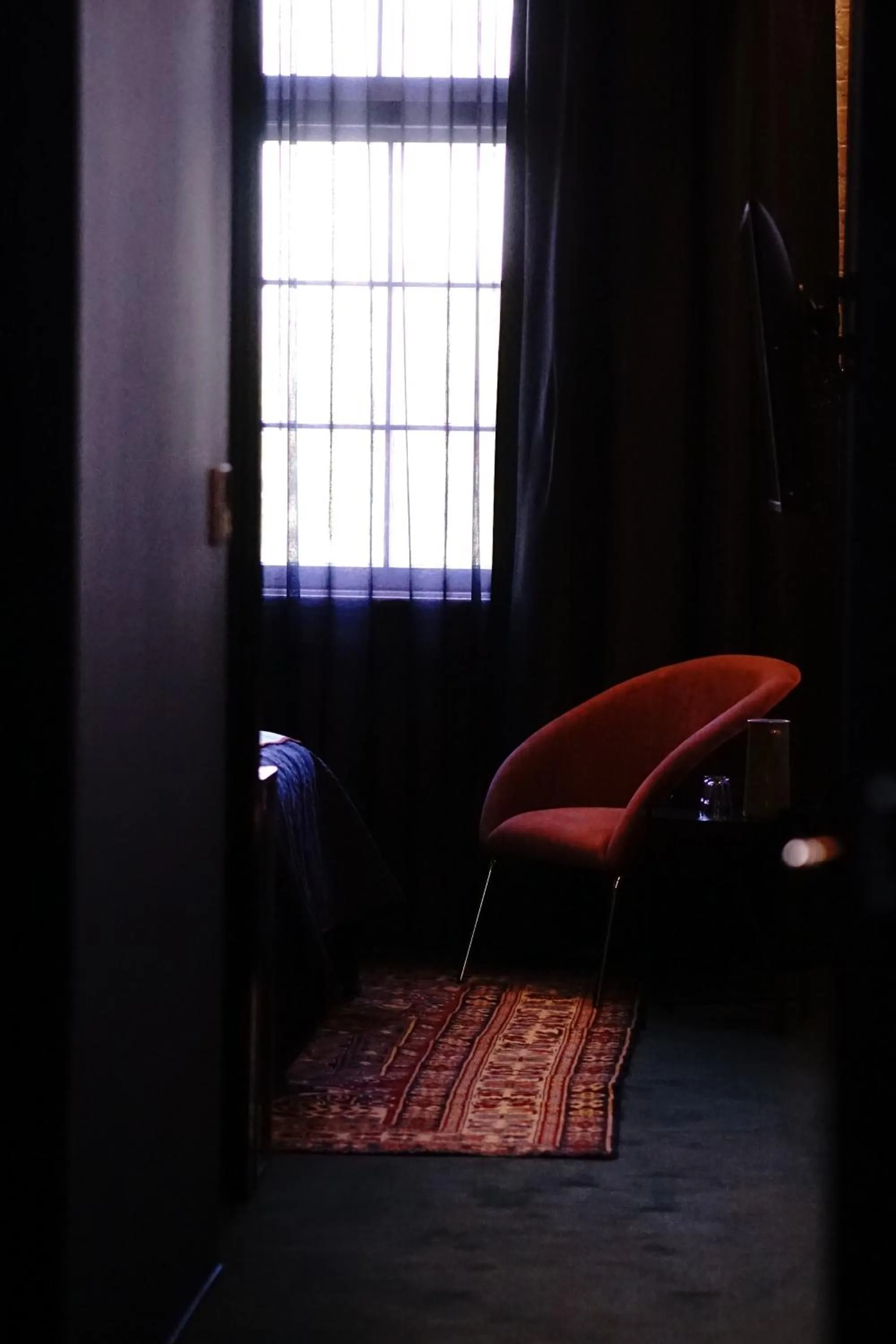 Bedroom in The Intrepid Hotel
