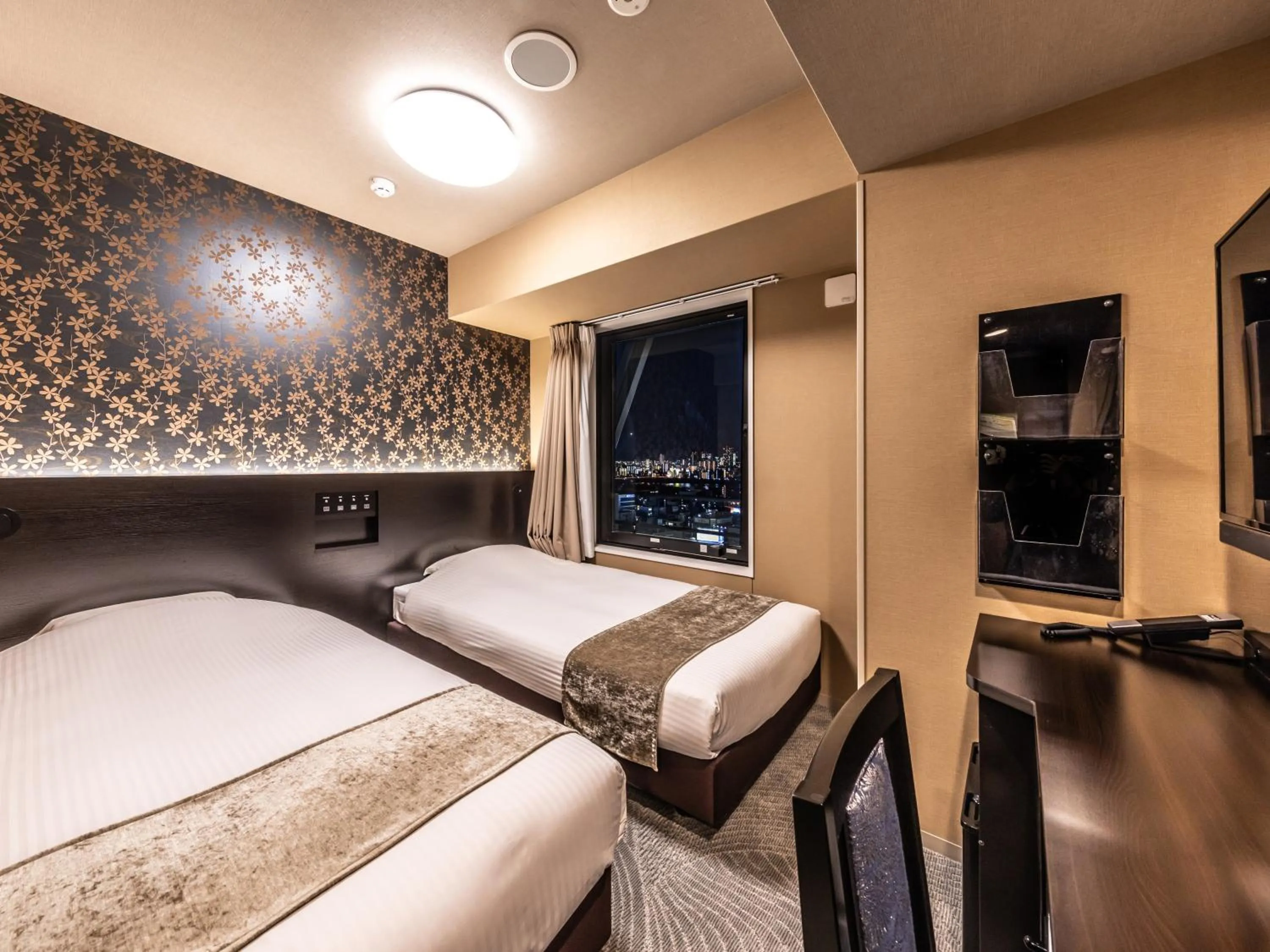 Photo of the whole room, Bed in APA Hotel Shin Osaka Ekimae Tower