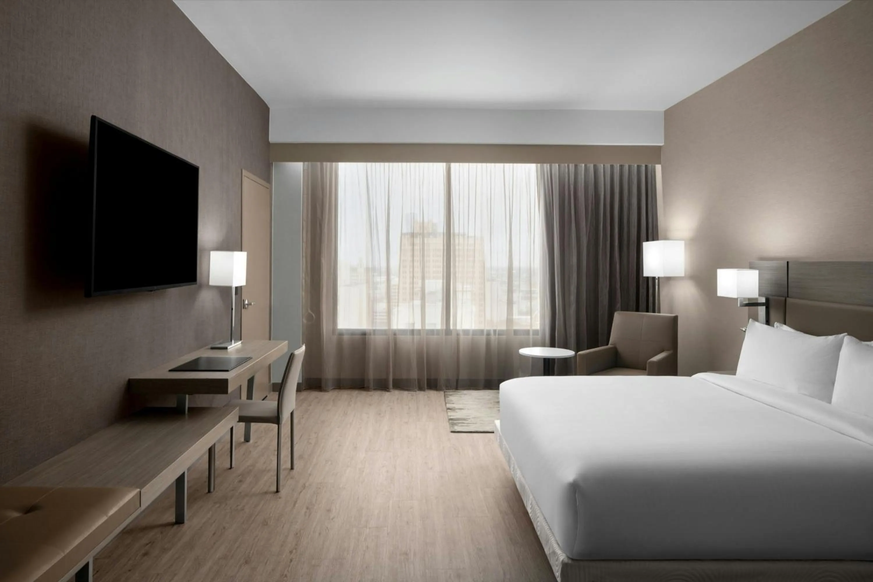 Photo of the whole room, Bed in AC Hotel by Marriott San Antonio Riverwalk