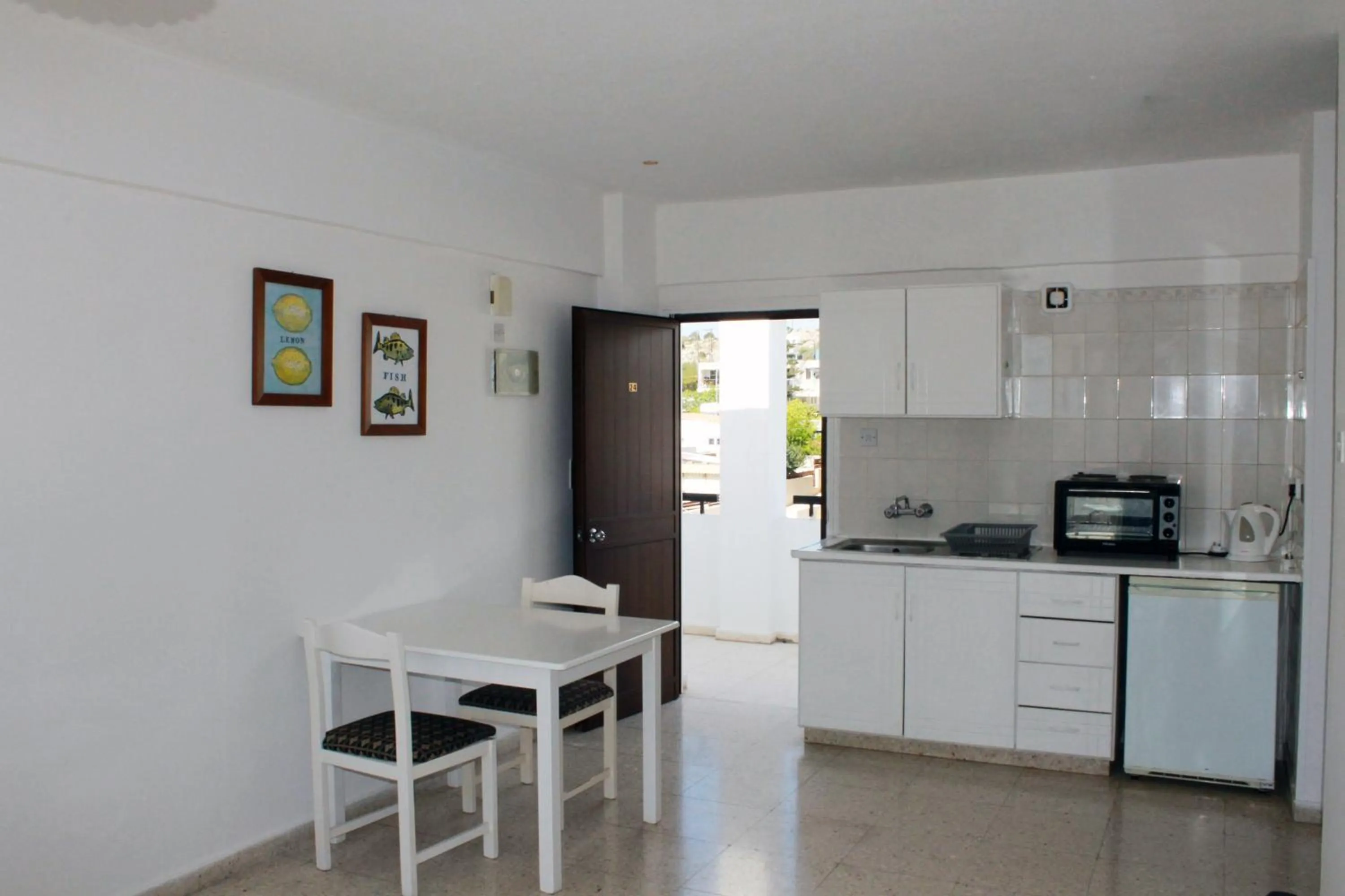 Kitchen or kitchenette in Florea Hotel Apartments