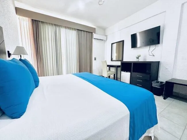 Bed in Hotel Posada del Mar