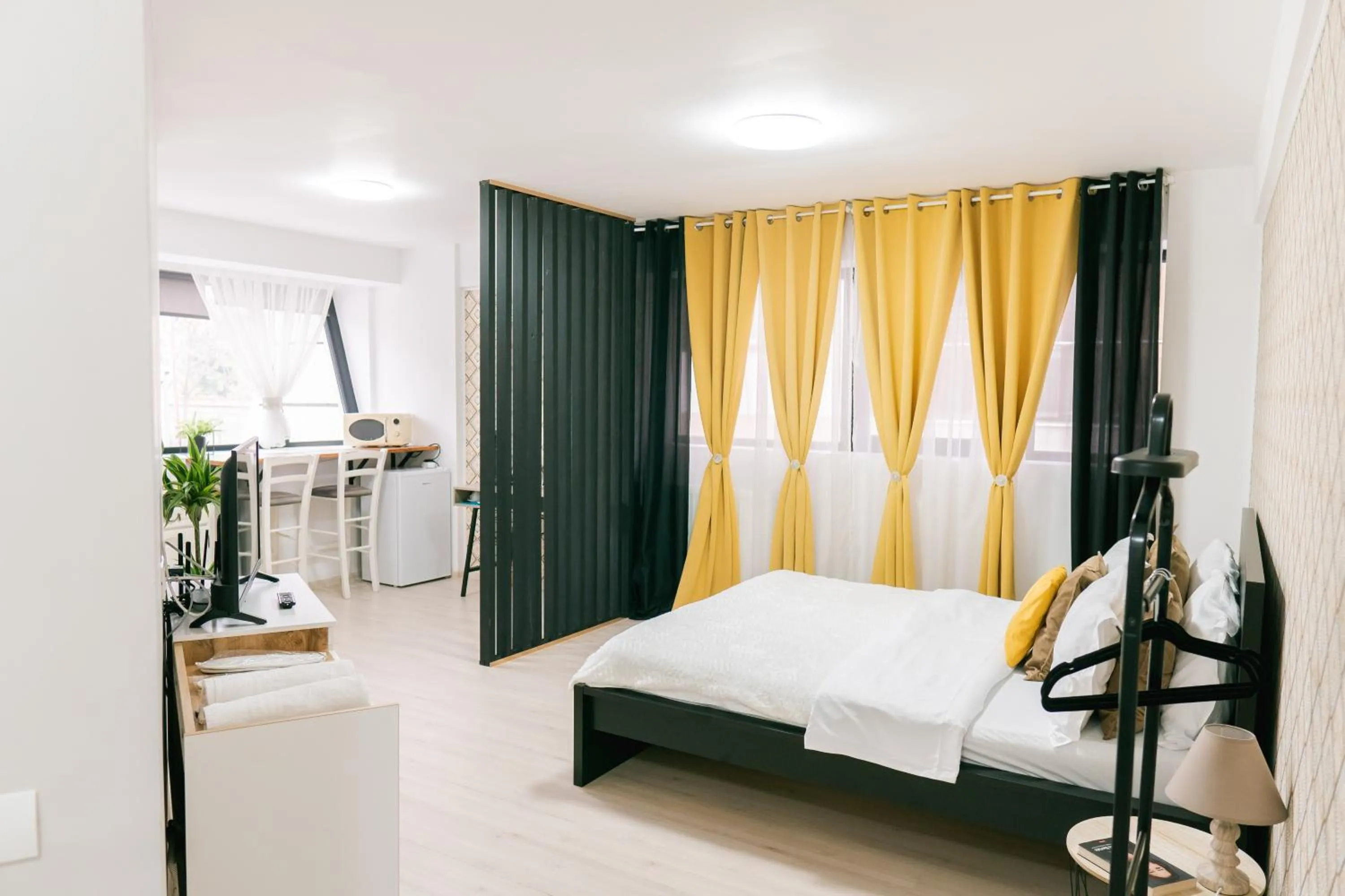 Photo of the whole room, Bed in Chic Studio