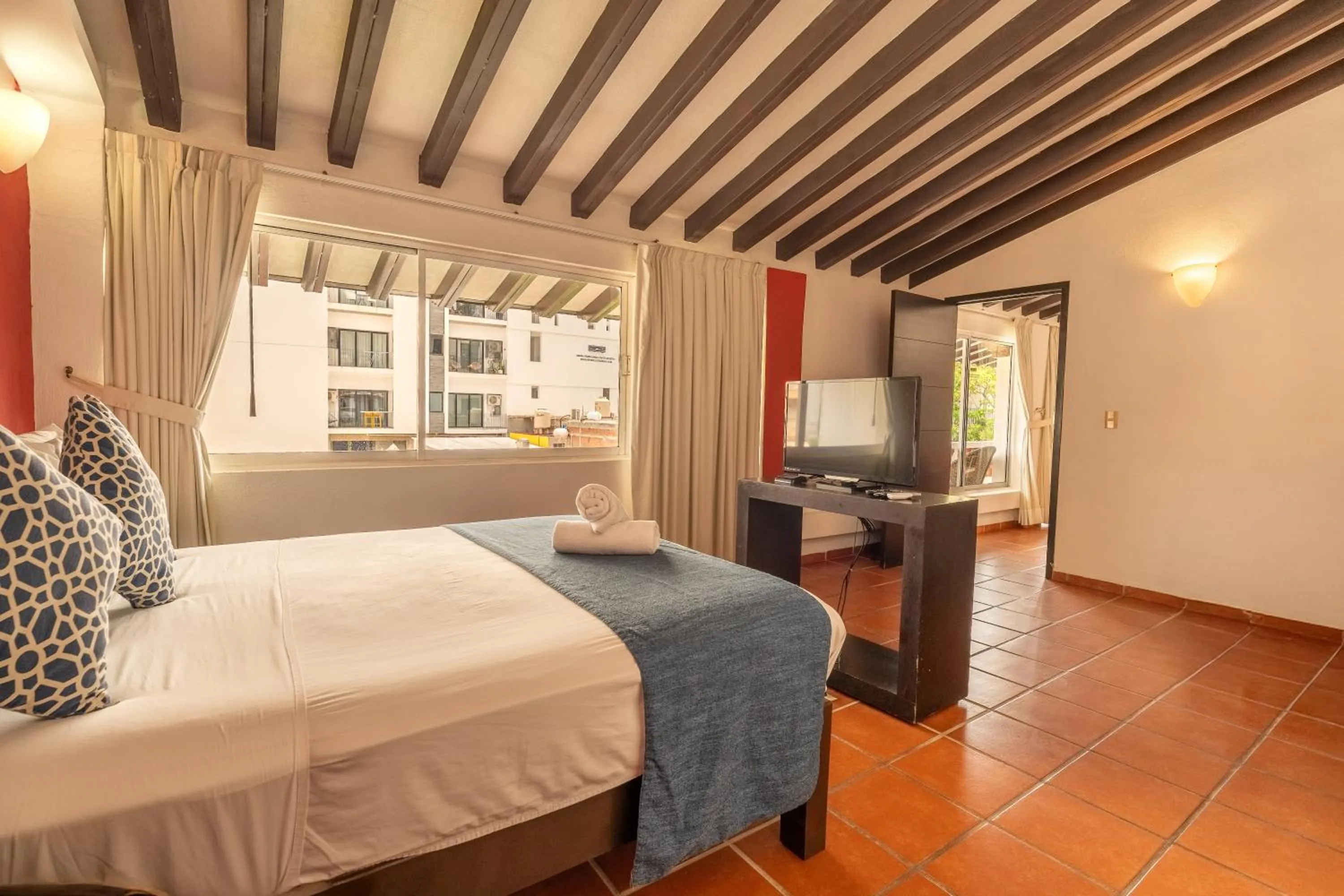 Photo of the whole room, Bed in La Iguana Vallarta LGBT ADULTS ONLY - Romantic Zone - Party Clubbing Street