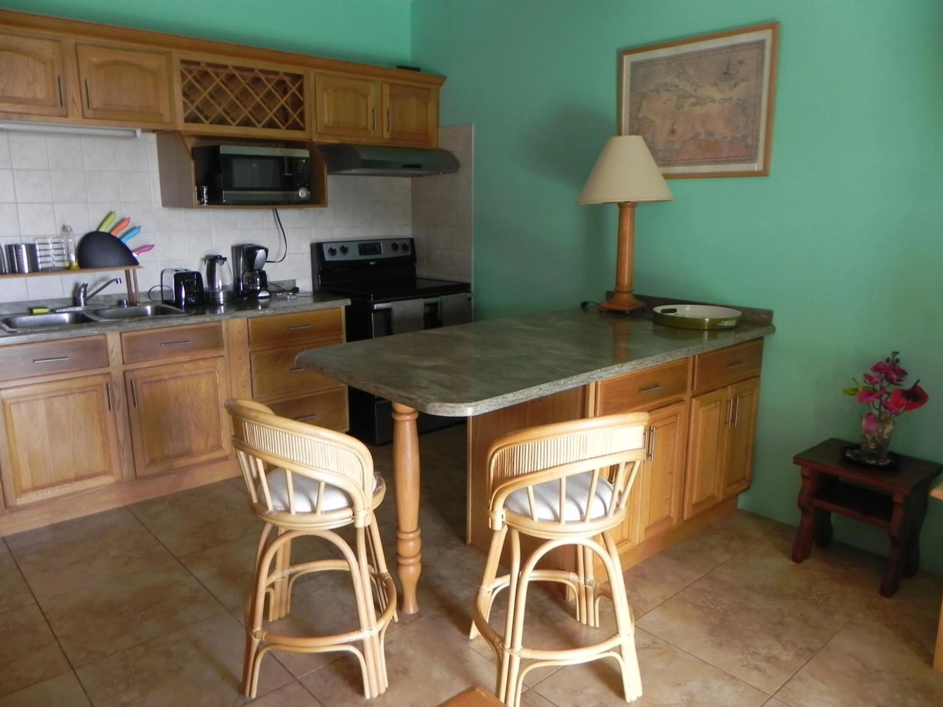 Kitchen or kitchenette in Villa Touloulou
