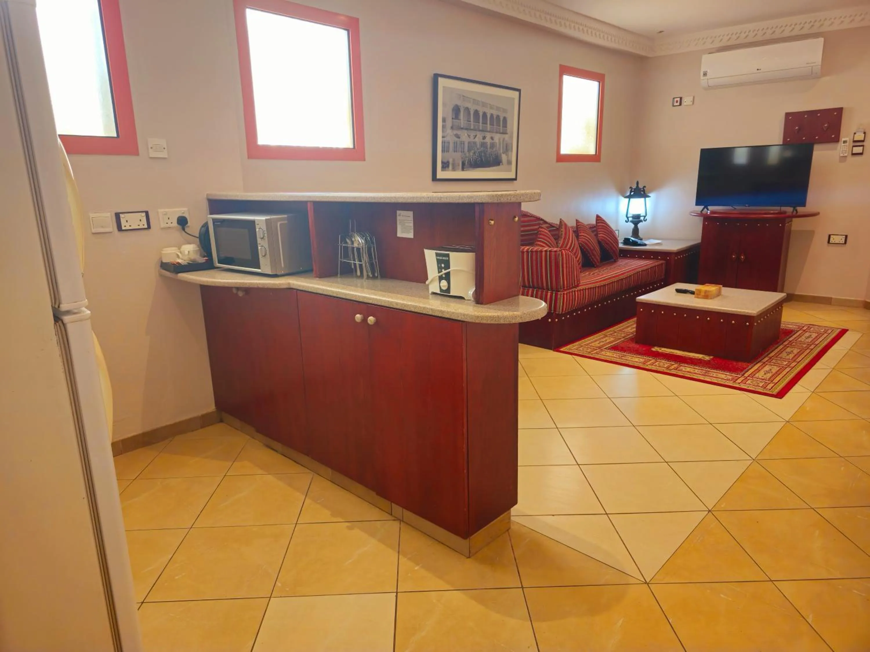 Kitchen or kitchenette in Al Liwan Suites