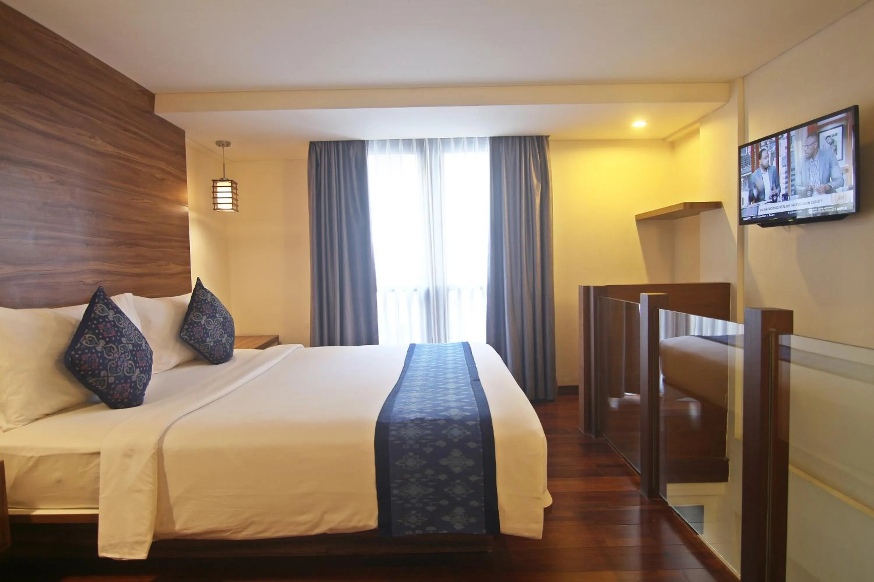 Bed in The Legian Sunset Residence