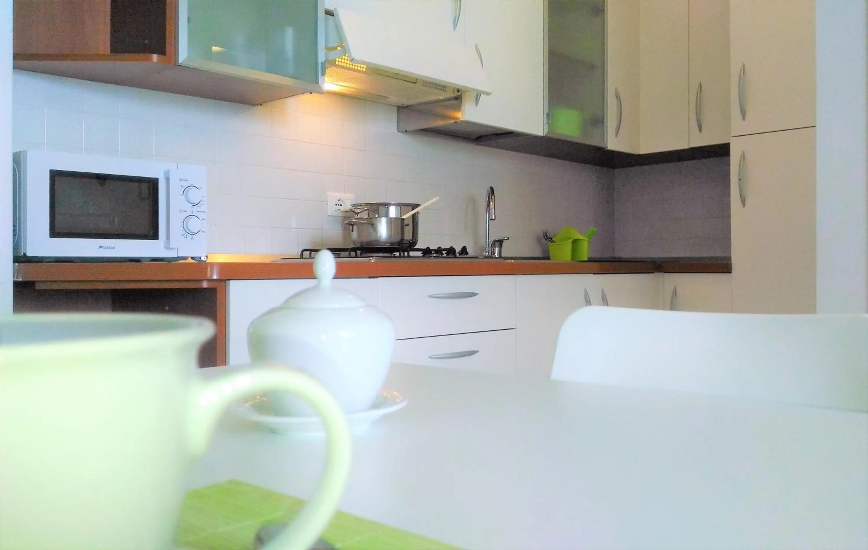 Kitchen or kitchenette in Green Holiday Wohnung mit Schwimmbad