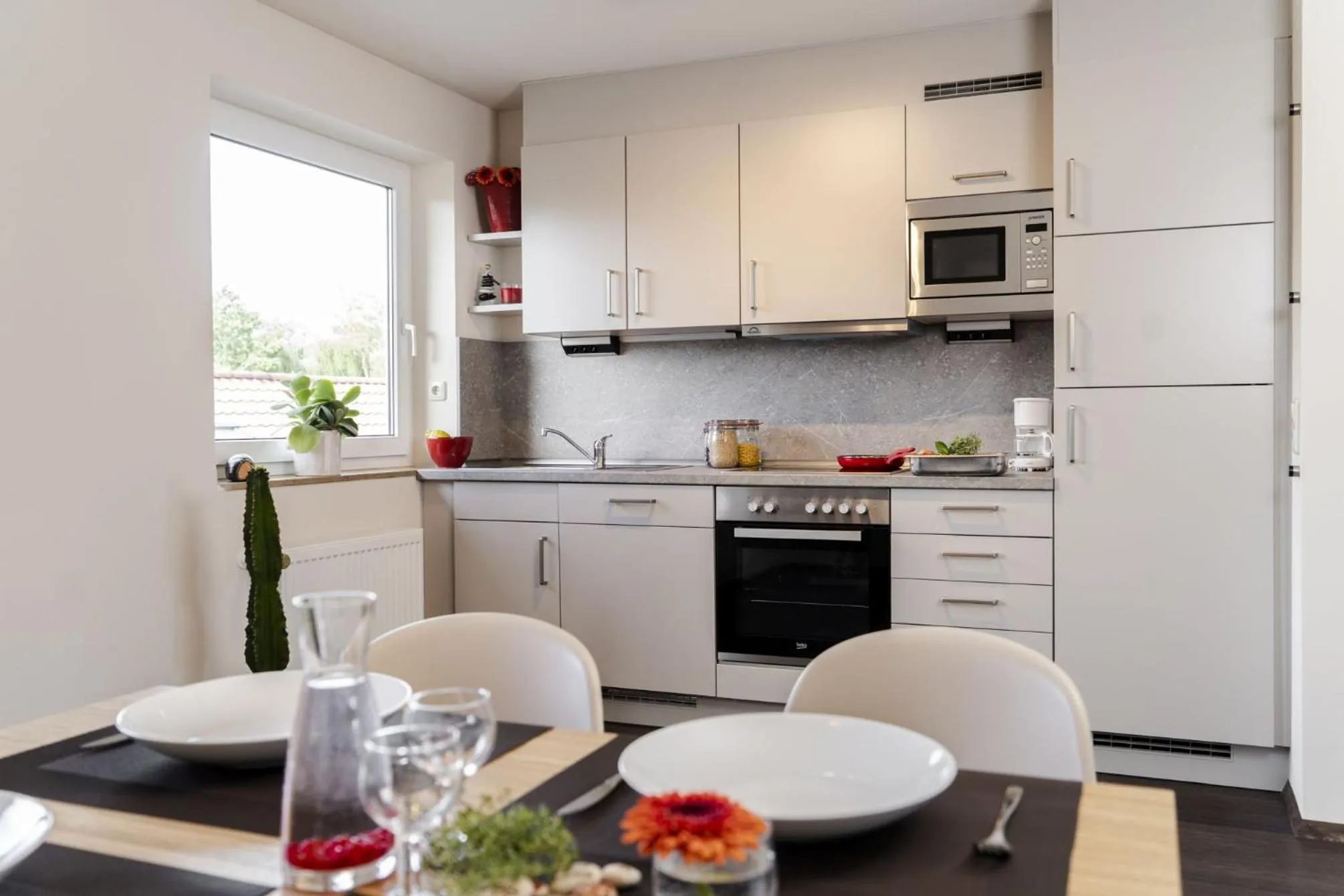 Kitchen or kitchenette in Hotel & Apartments Böhm