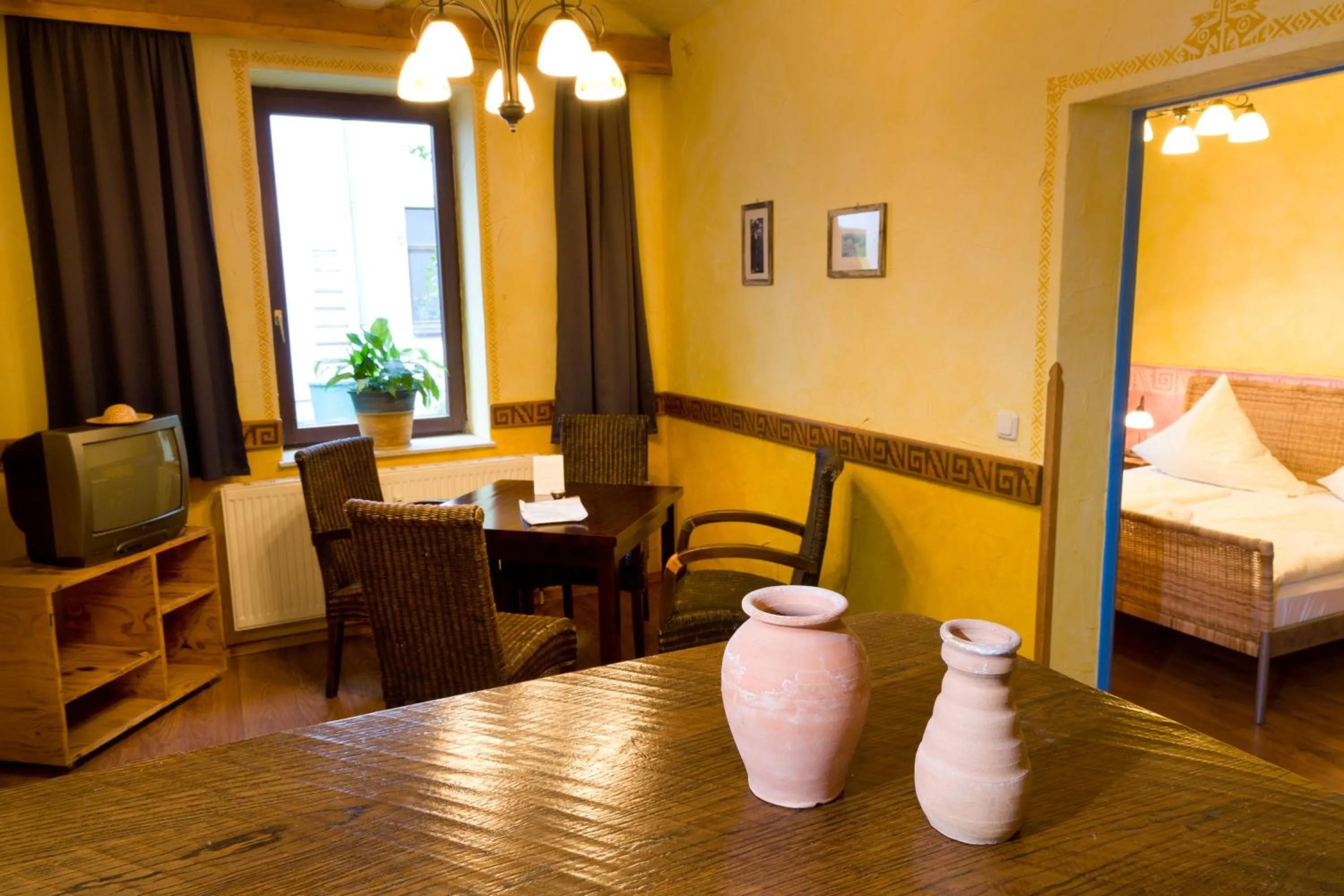 Seating area, Bed in Gästehaus Mezcalero