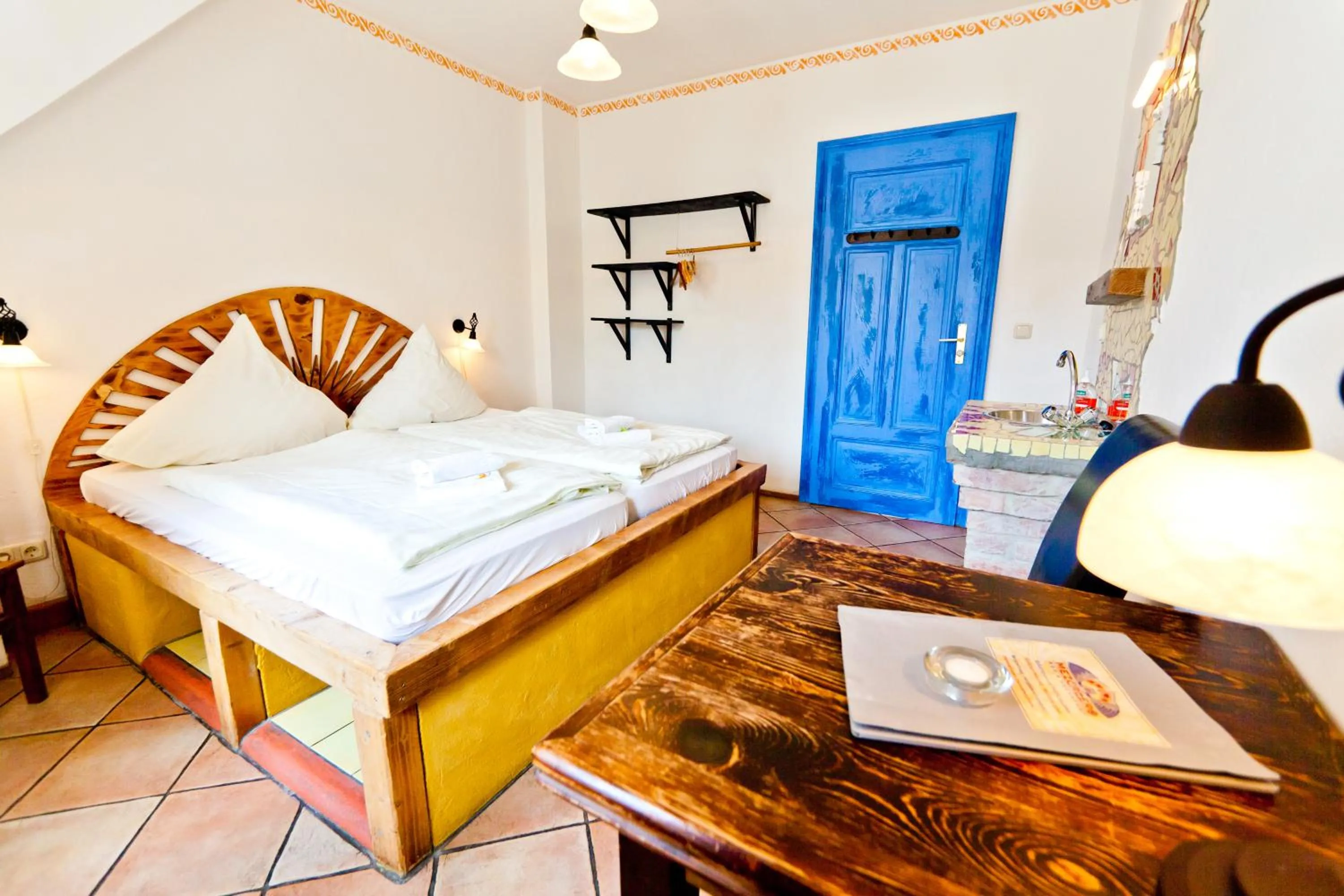 Photo of the whole room, Bed in Gästehaus Mezcalero